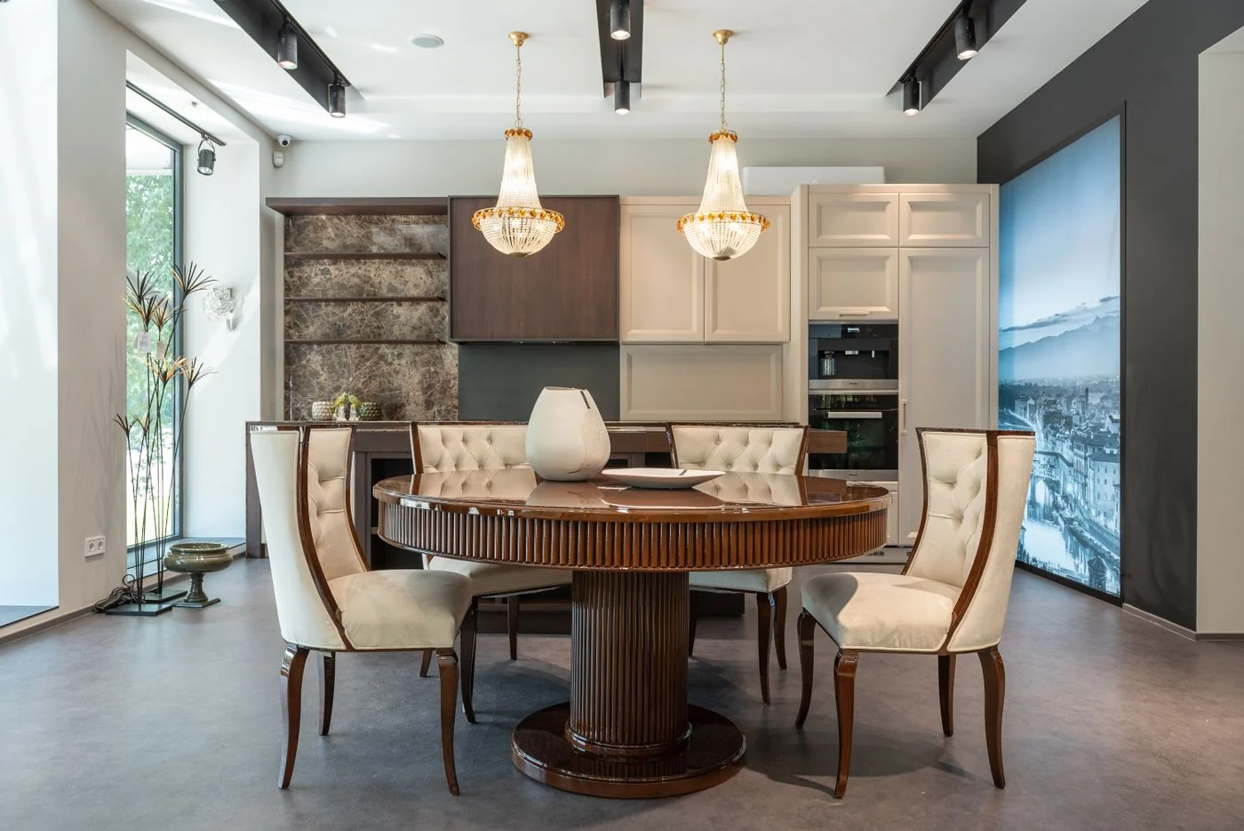 Cozy dining room with wooden table, elegant chairs, and beautiful chandelier.