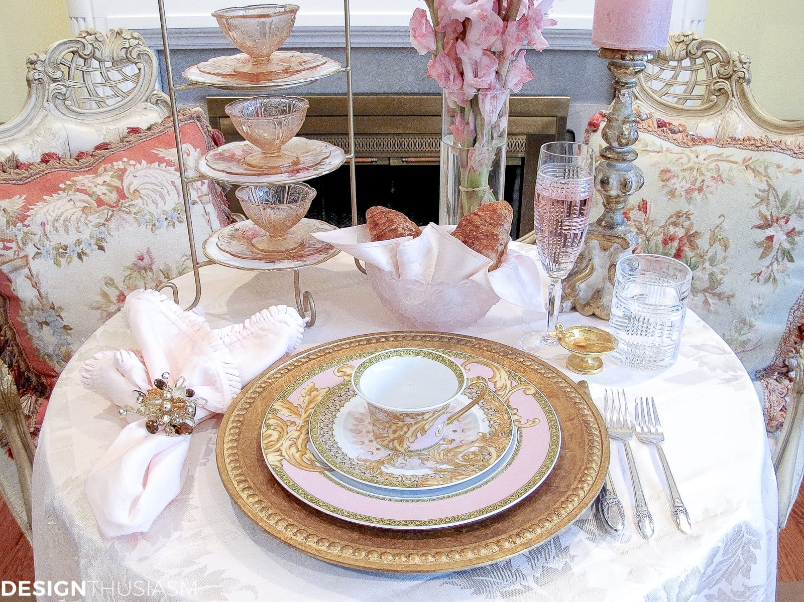 Tea party table setting with pink and gold Versace plates