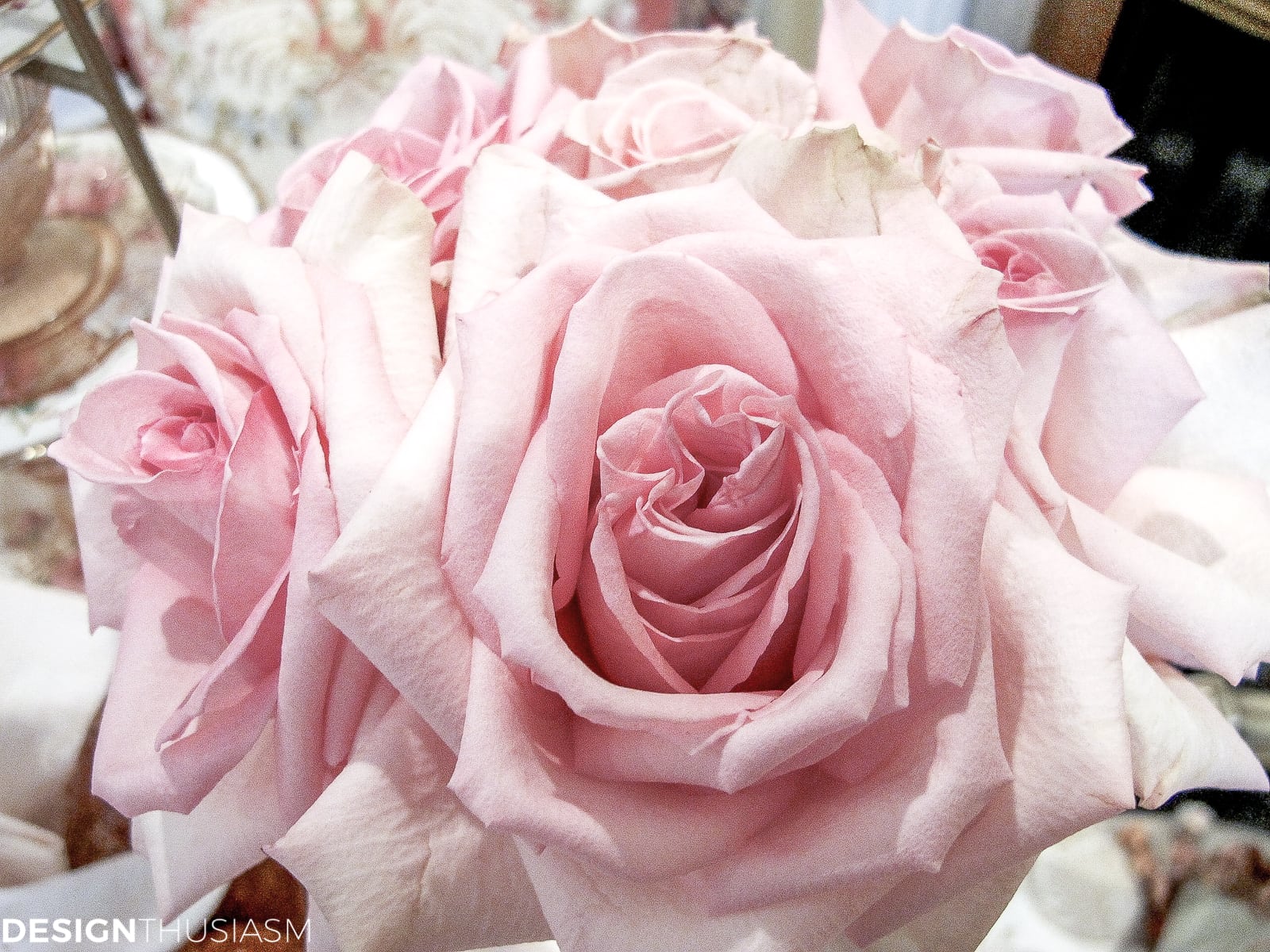 Tea party table setting with blush pink roses