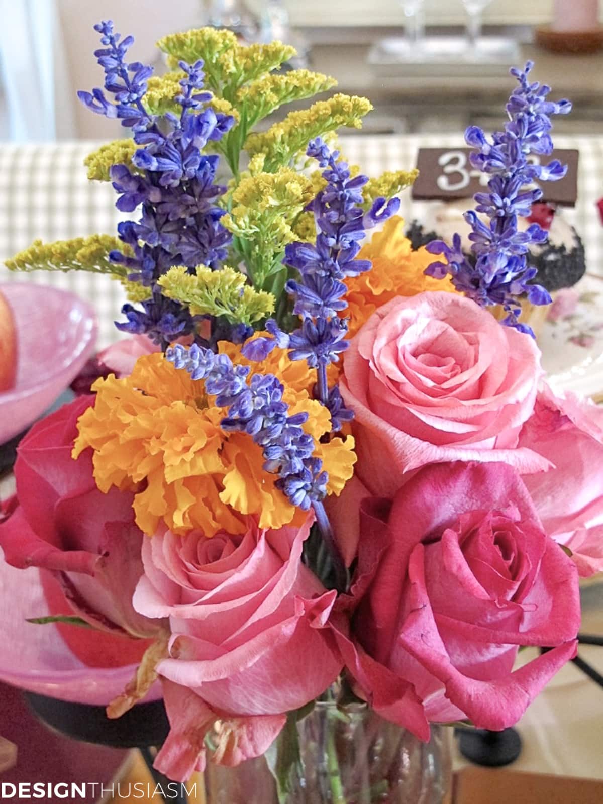 flowers for a book club table setting with vintage books