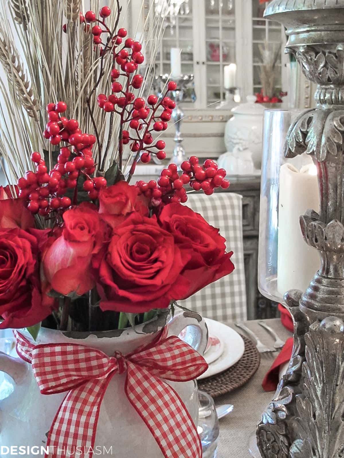 red floral in a rustic table setting