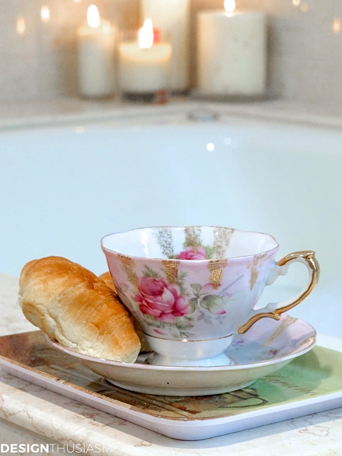 vintage tea cup and saucer on a bathtub surround