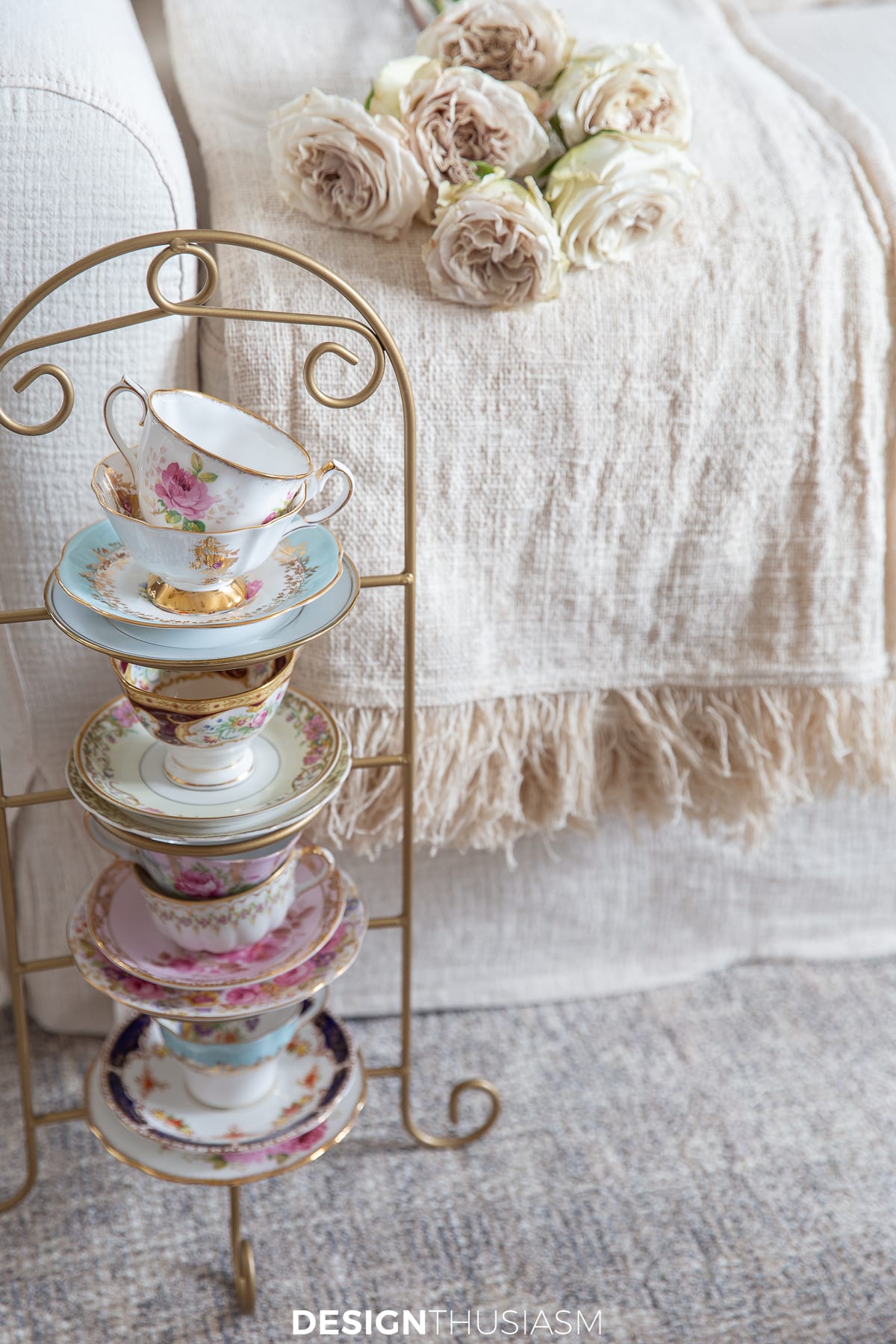 teacups displayed on a plate stand