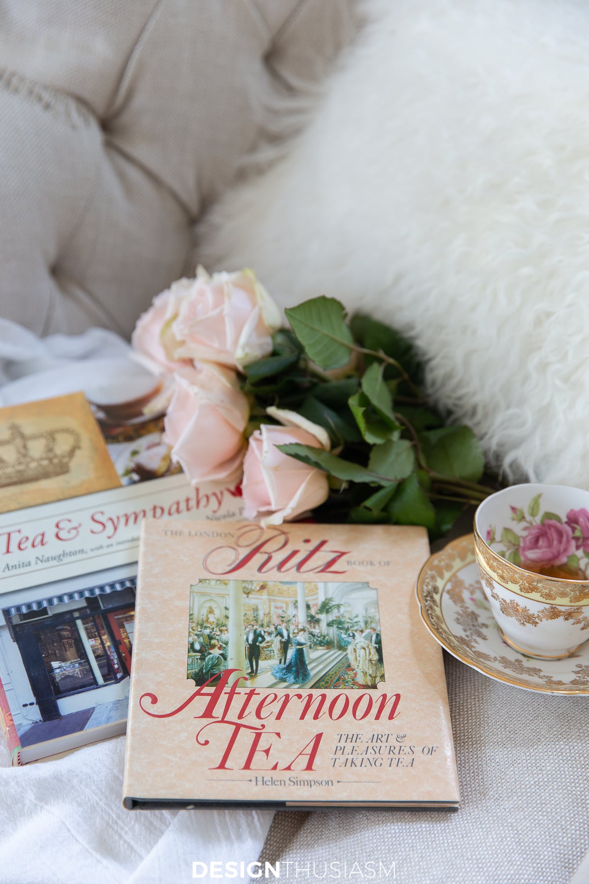 teacup displayed with tea books
