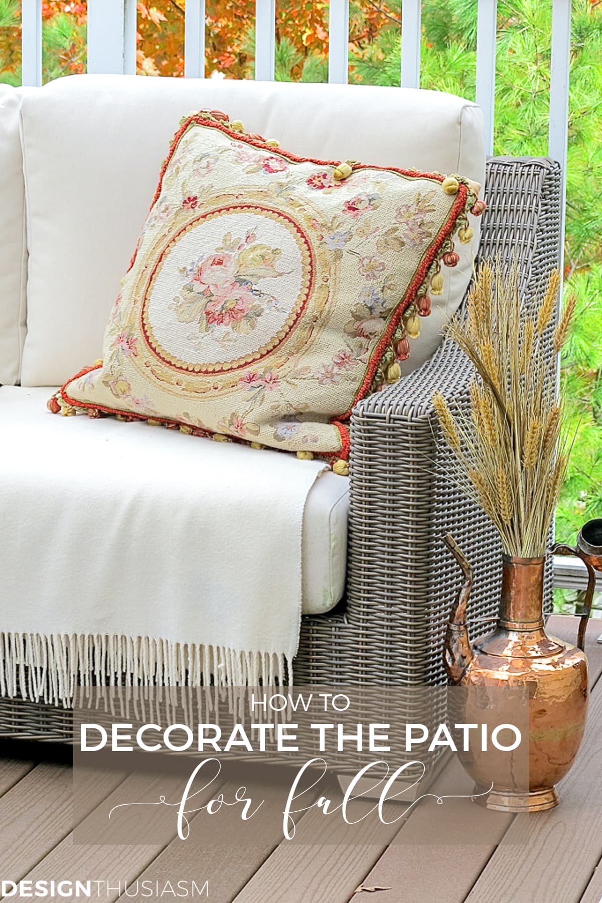 fall patio with copper urn and needlepoint pillow