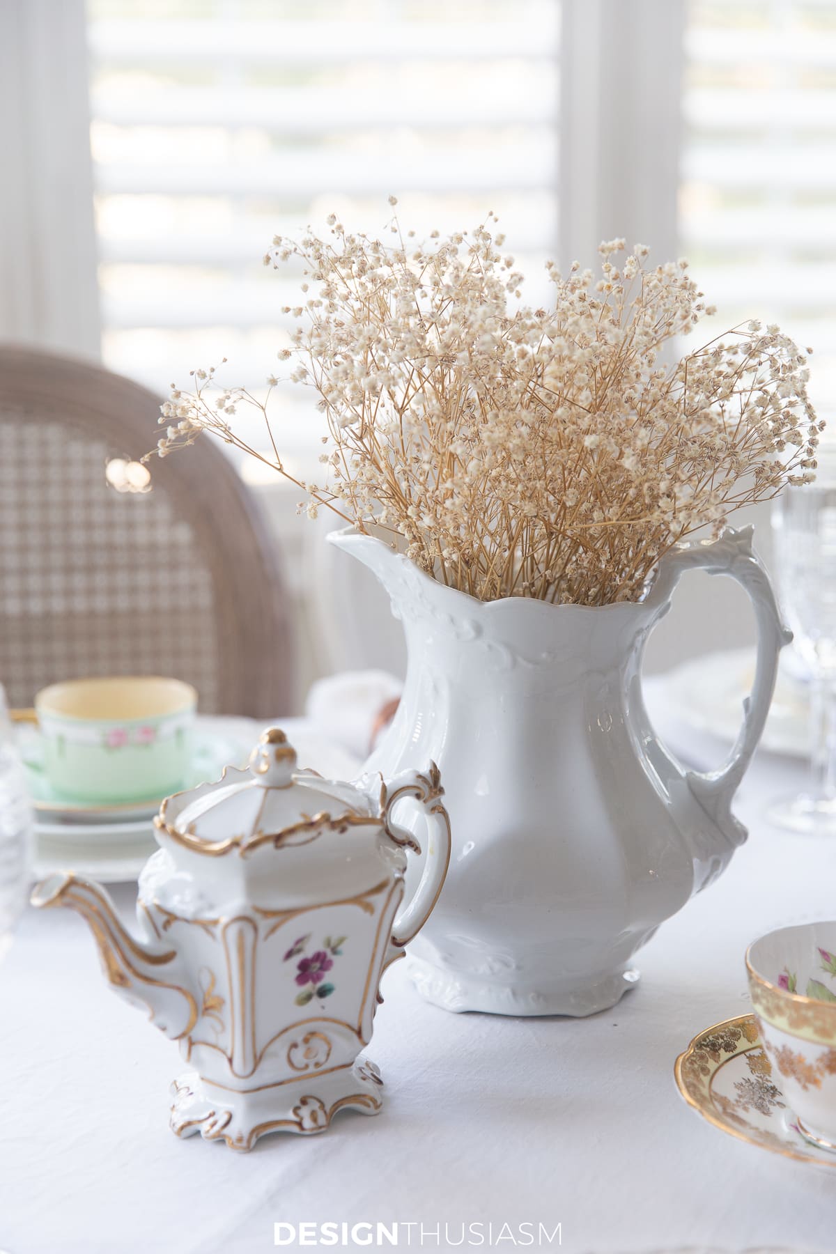baby's breath in vintage pitcher for afternoon tea table