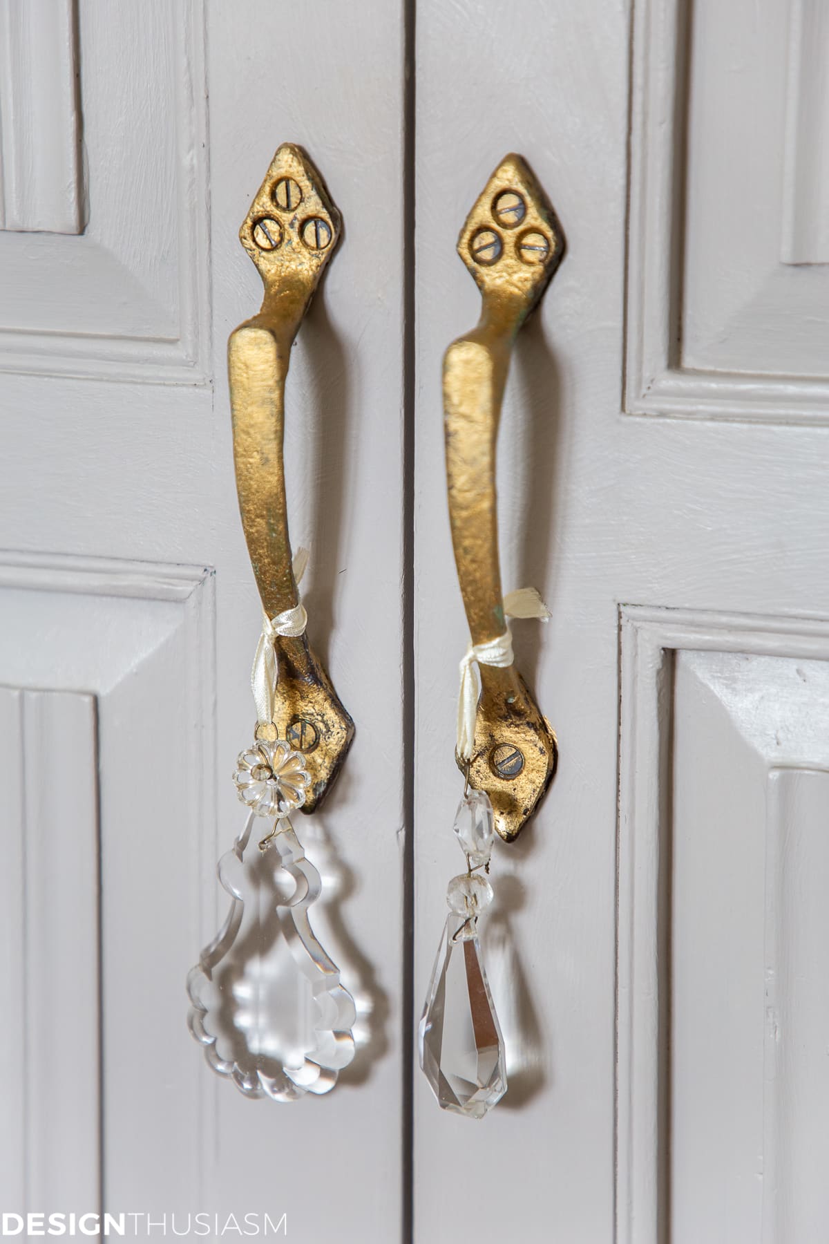 Defining style elements for a french inspired home - crystal drops on cabinet doors
