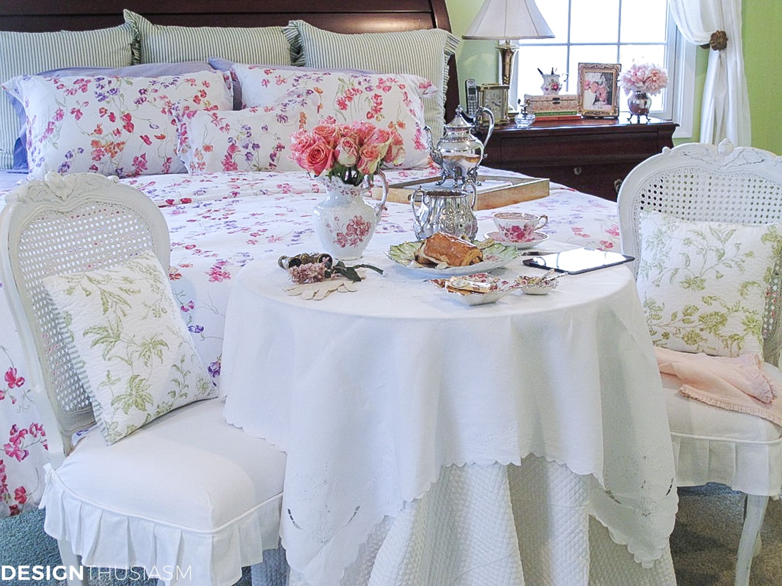 master bedroom decor with a french style breakfast nook at the foot of the bed