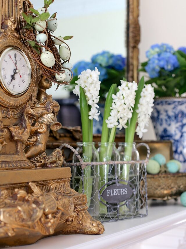 spring mantel clock and hyacinths