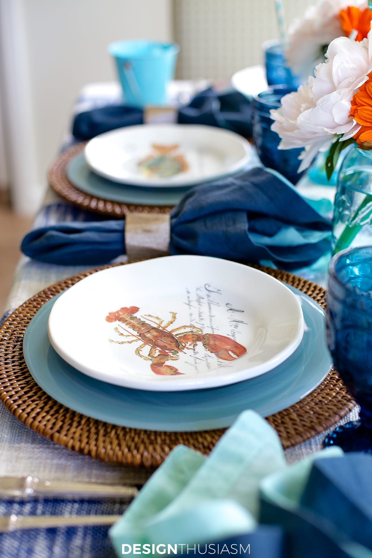 summer clambake table with seafood plates