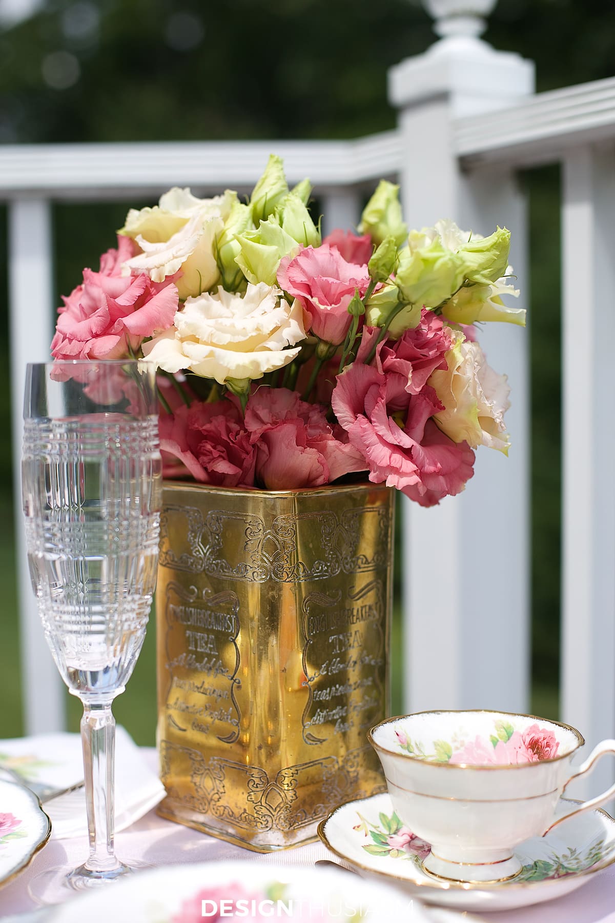 french outdoor tea table flowers in a tea tin