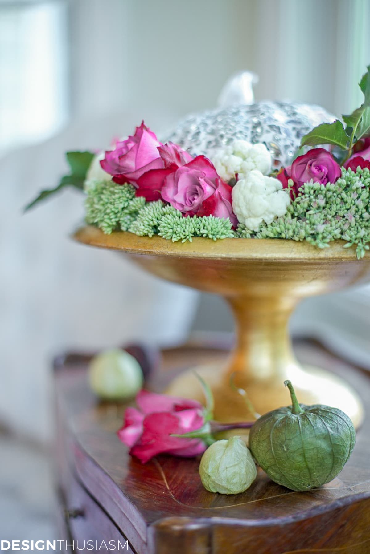 fall centerpiece with cauliflower and roses