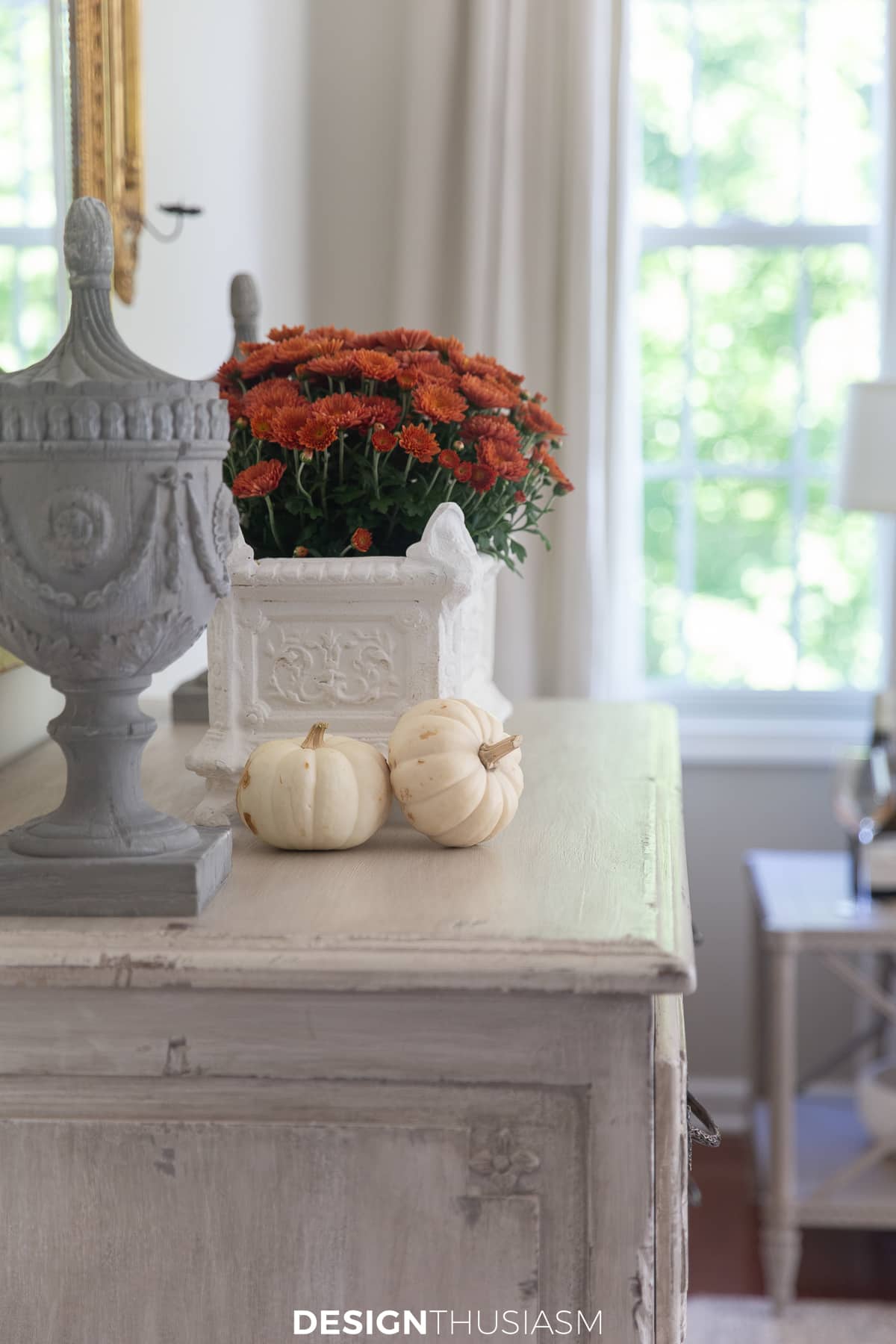 fall living room mums on the sideboard