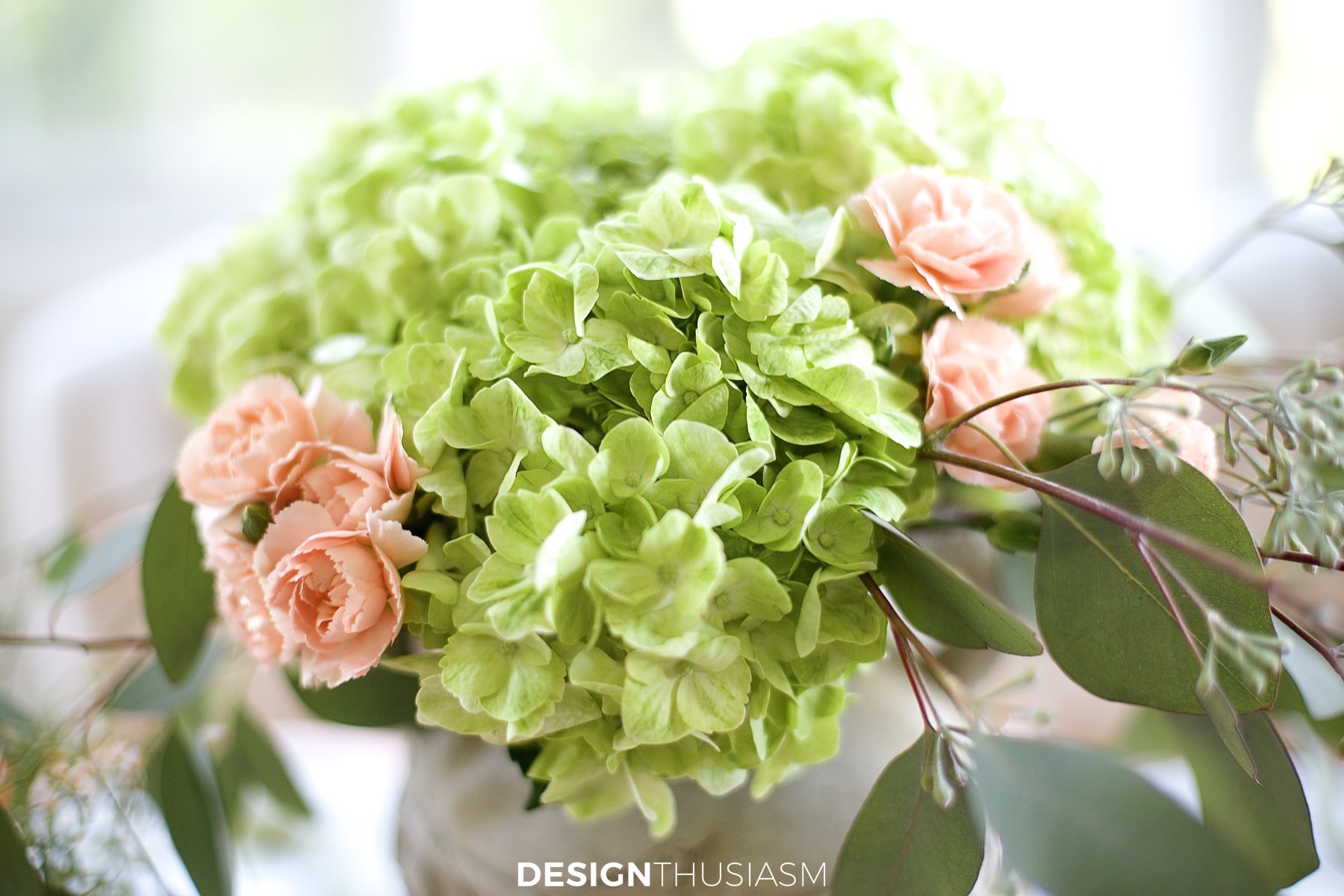hydrangeas and roses in a fall tablescape