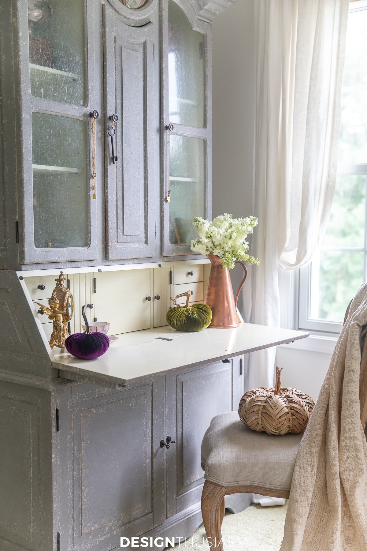fall bedroom decor | pumpkins on writing desk with hutch