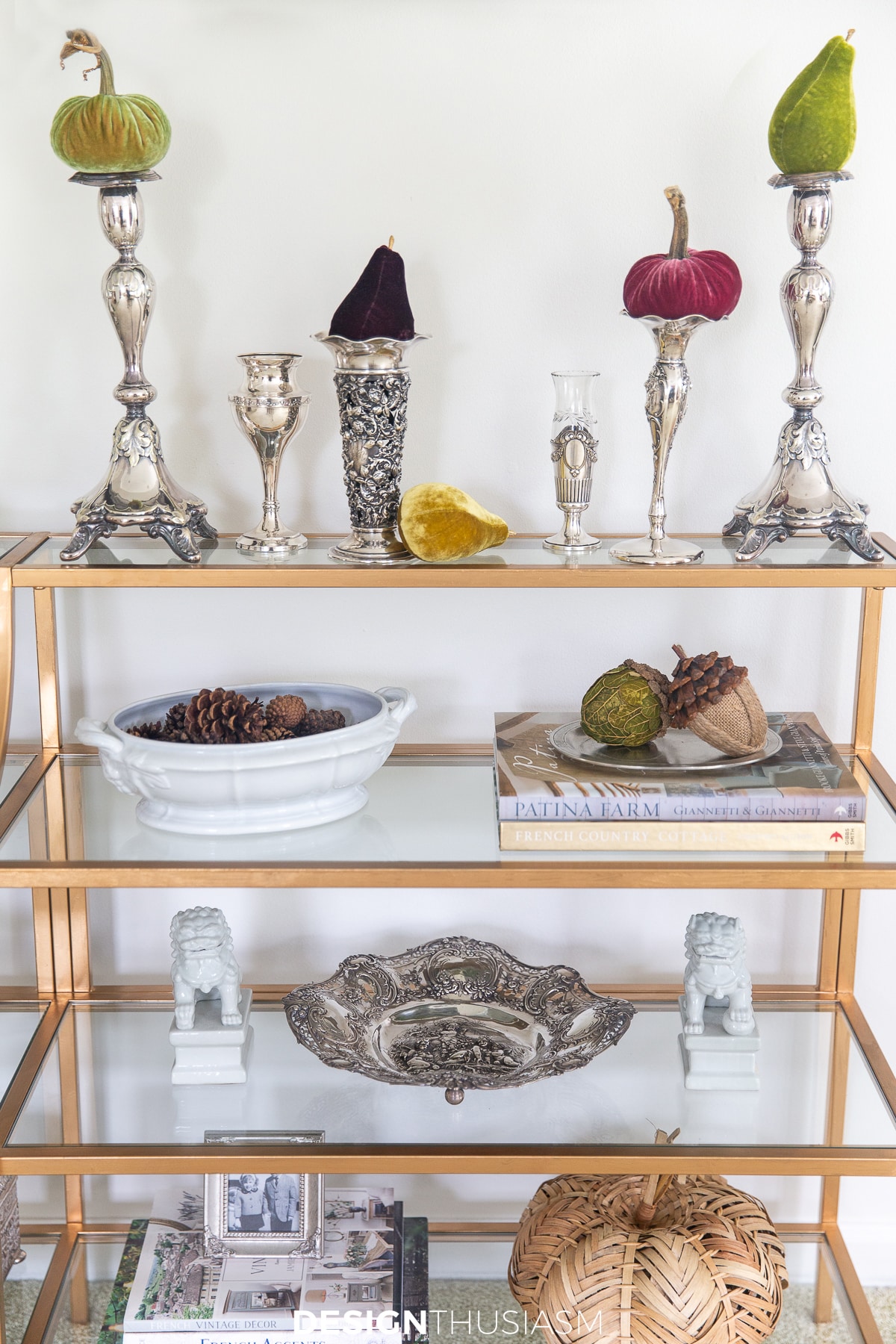 fall bedroom decor | pumpkins and gourds styled on a shelf unit