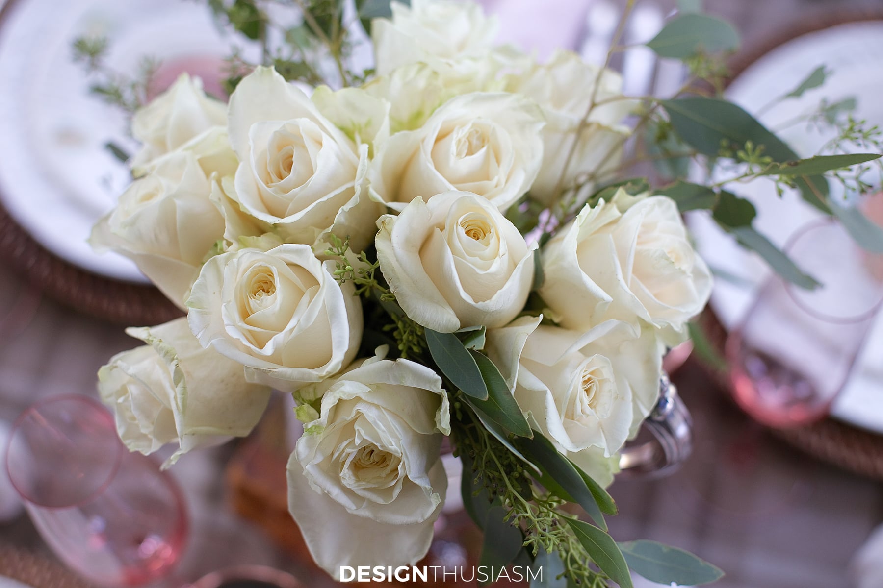 white roses on neutral fall tablescape