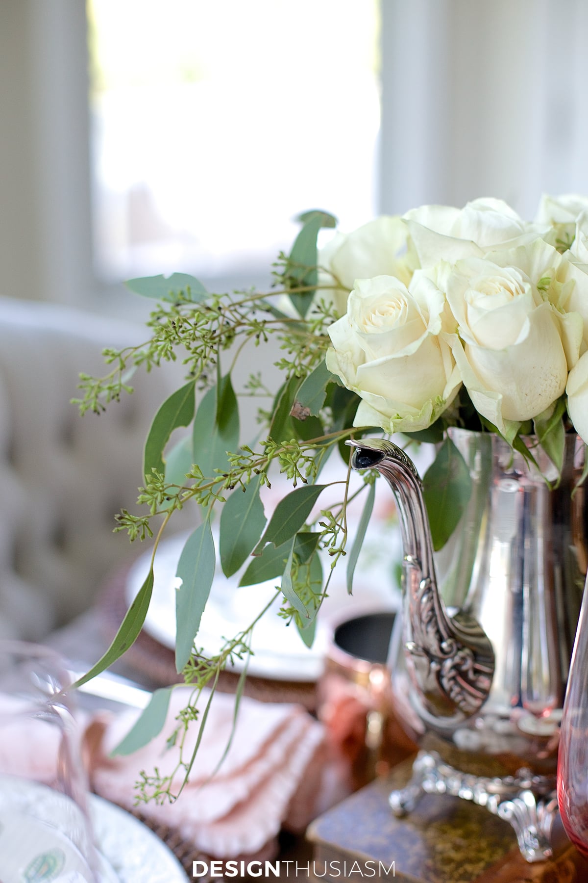 white roses on neutral fall tablescape