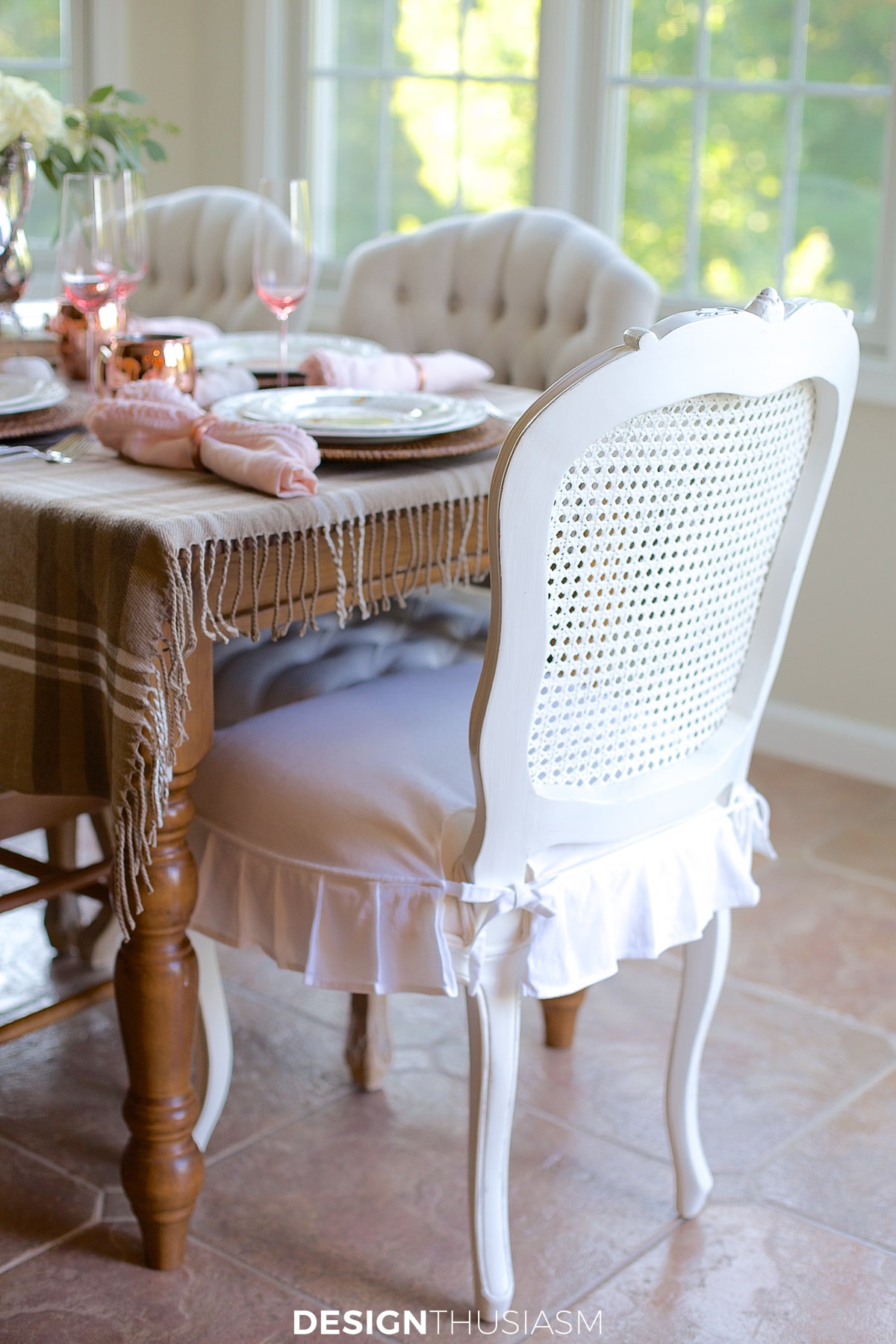 white cane chairs at neutral fall tablescape