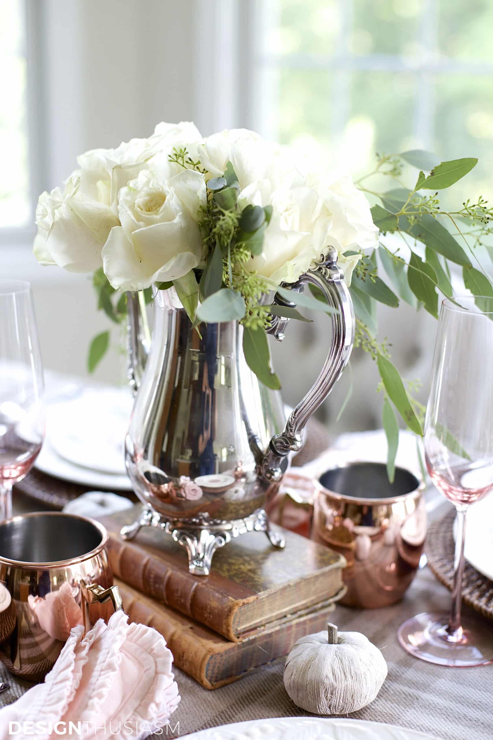 white roses on neutral fall tablescape