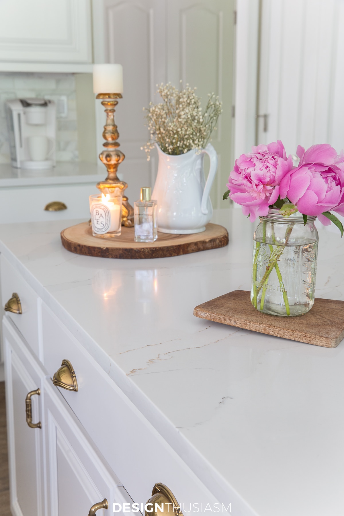pink peonies on white quartz counters