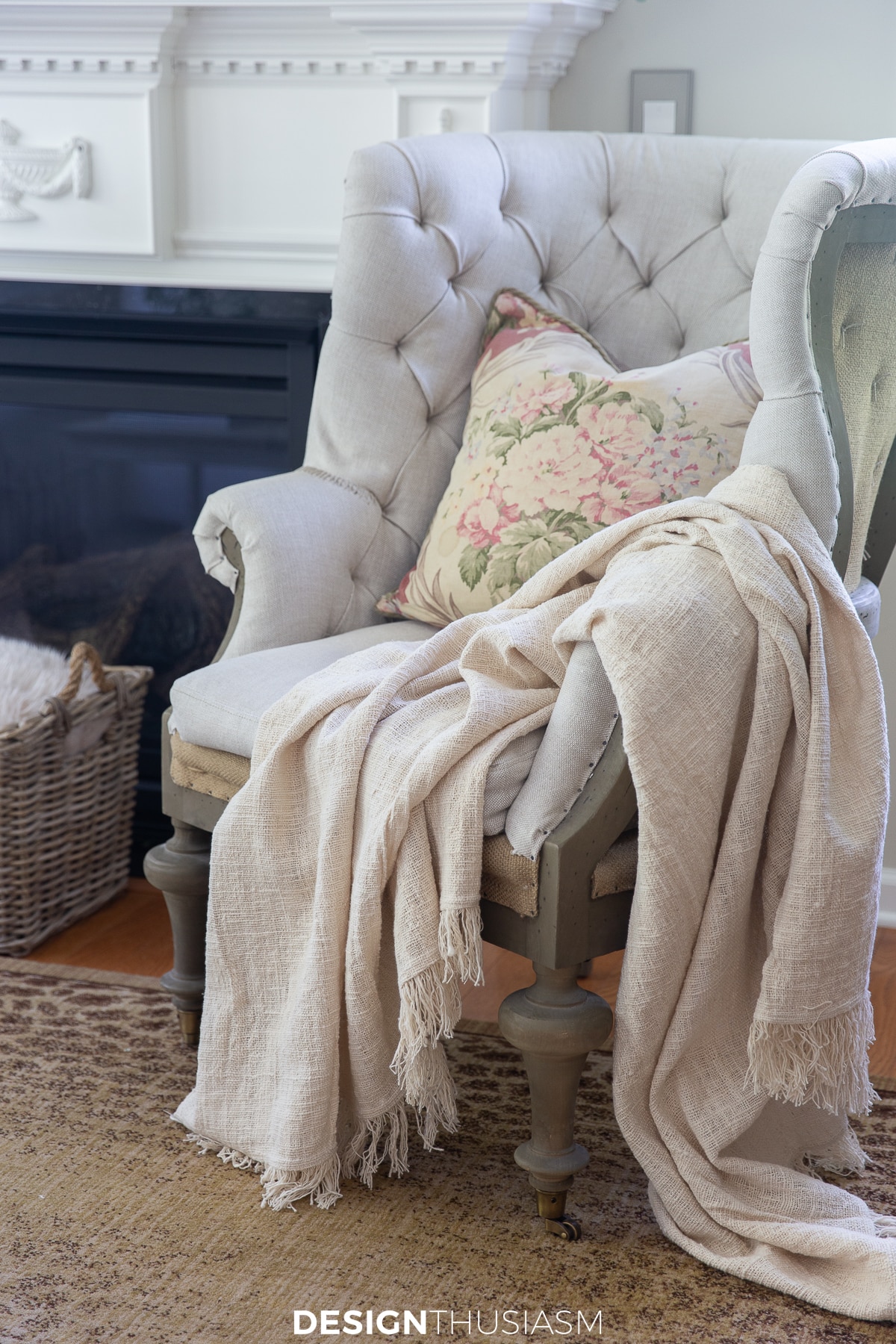 tufted wing back chair with pillow and throw blanket