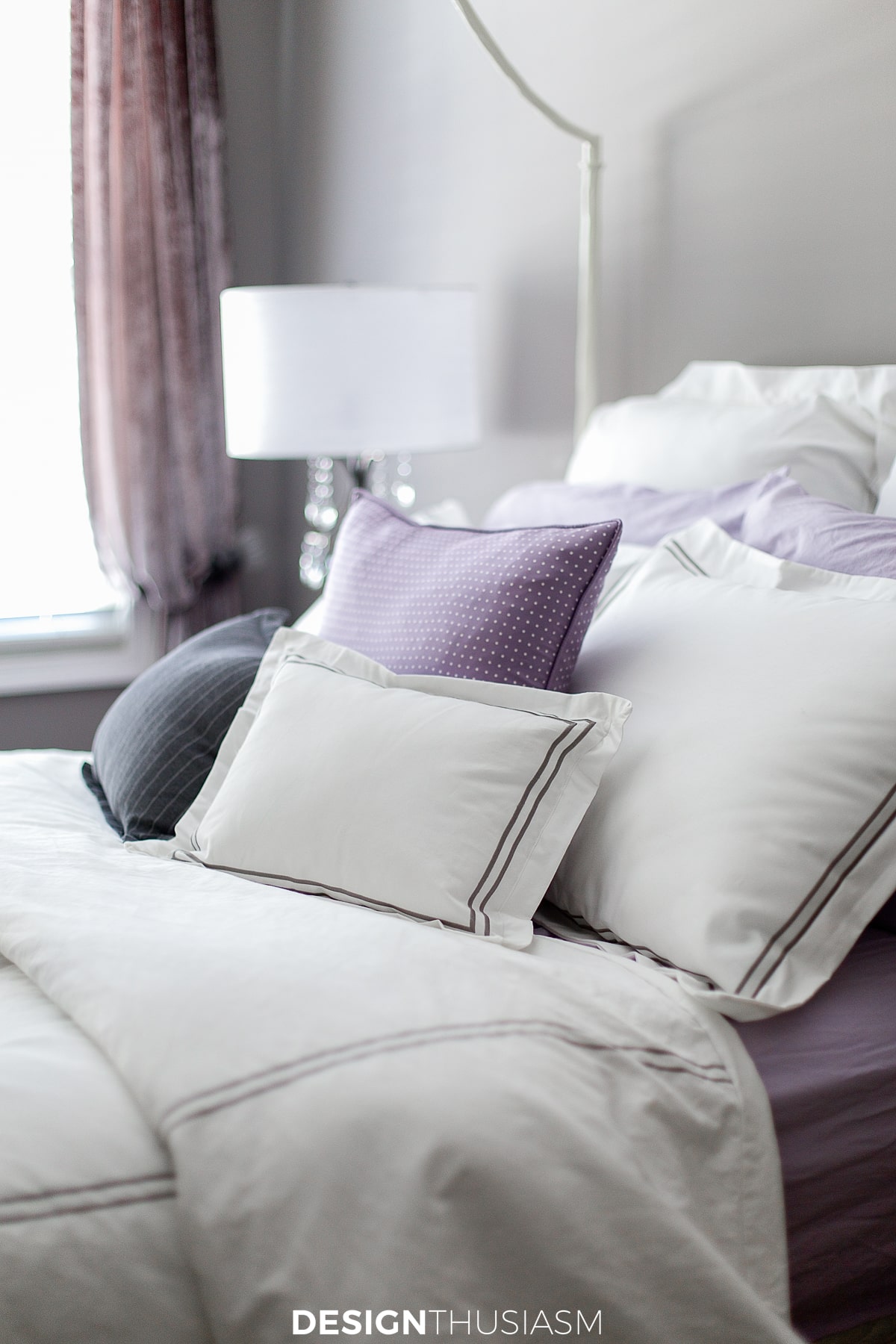 pillow shams in the lilac and grey bedroom