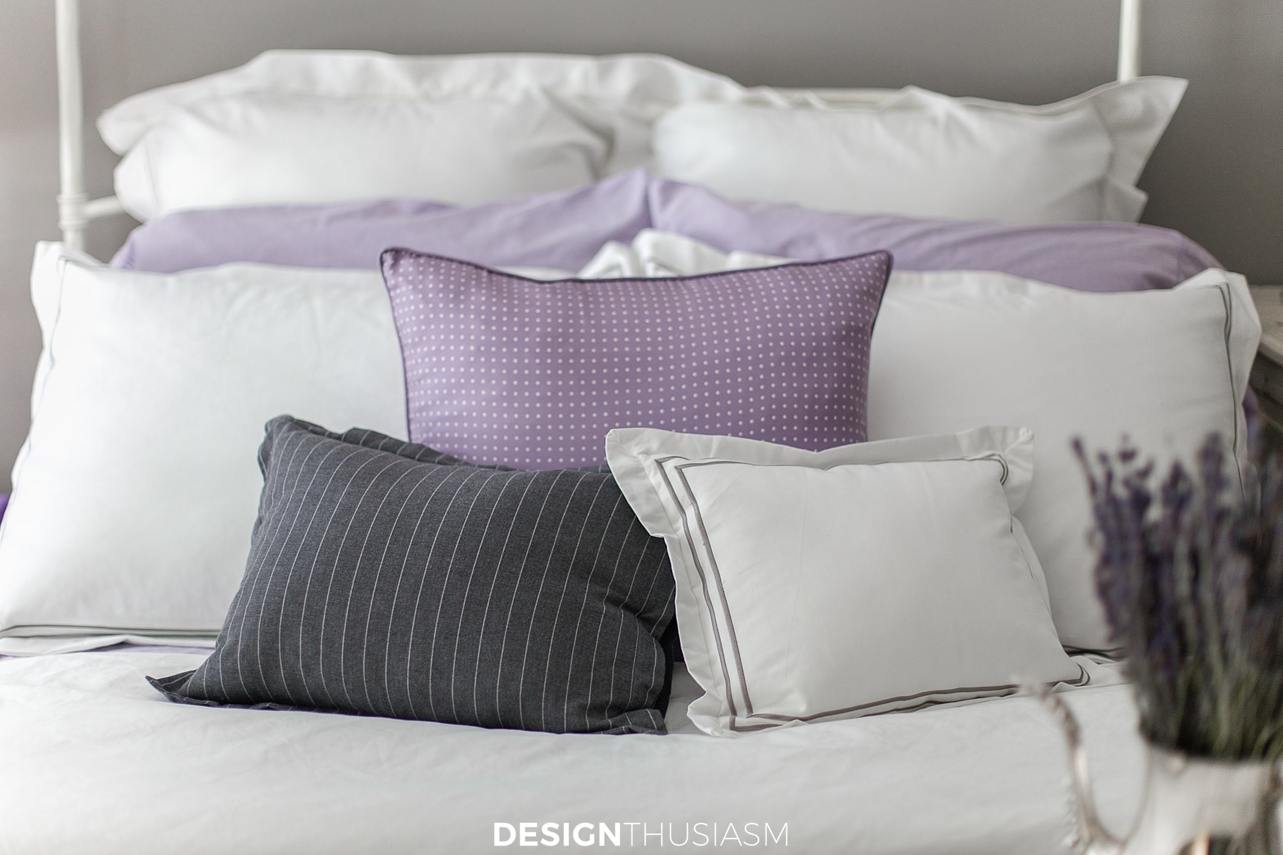 pillows in the lilac and grey bedroom