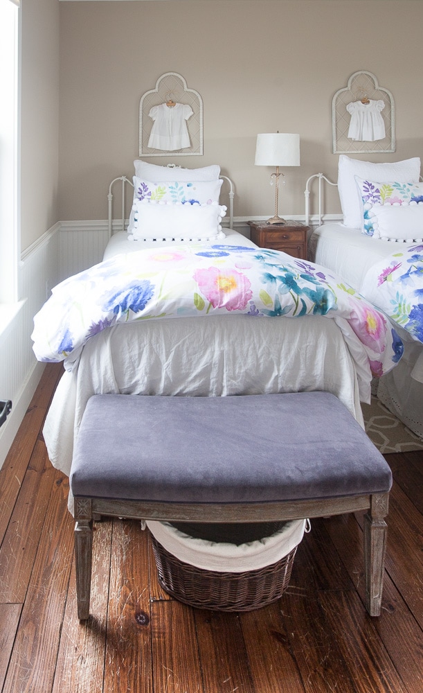 white-dress-above-floral-beds-3