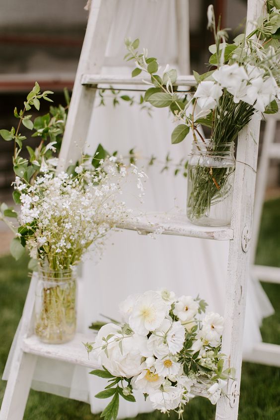 Mason jar flowers on ladder