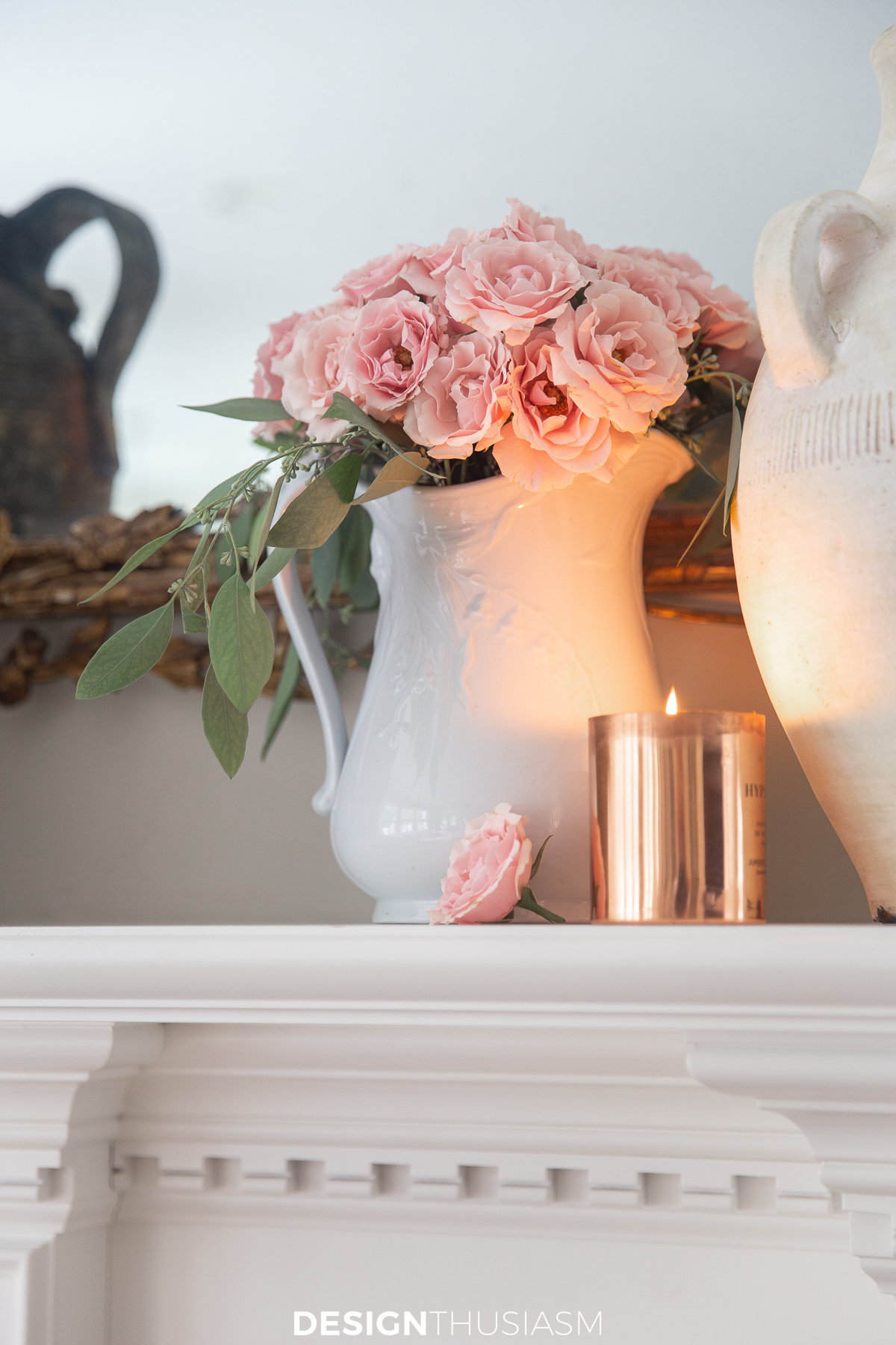 soft fall decor on the mantel with copper and pale pink