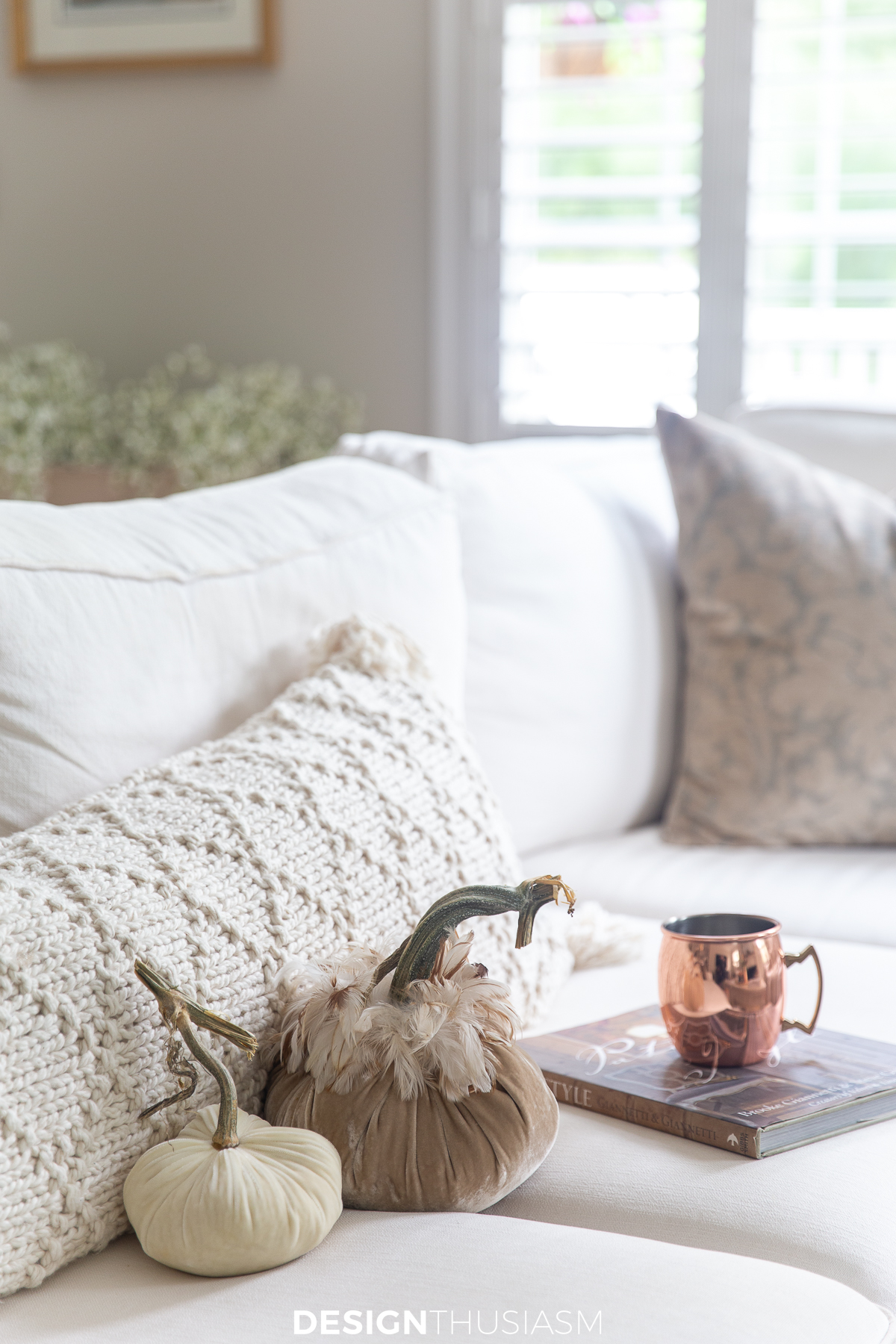 soft fall decor using sweater knit pillows, velvet pumpkins and a touch of copper