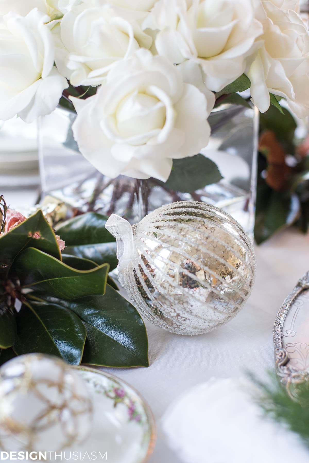 Holiday Table Settings: White Roses and Magnolia Leaves
