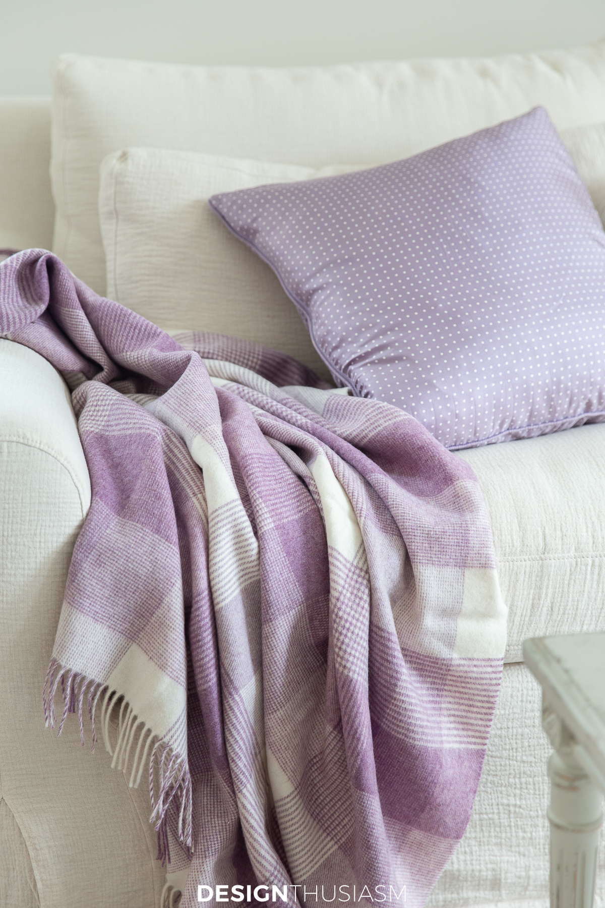 white and lilac throw blanket and pillow