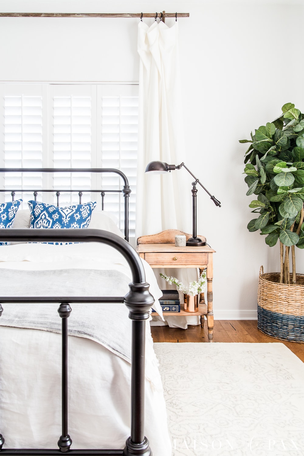 White-modern-farmhouse-master-bedroom-decorated-for-spring