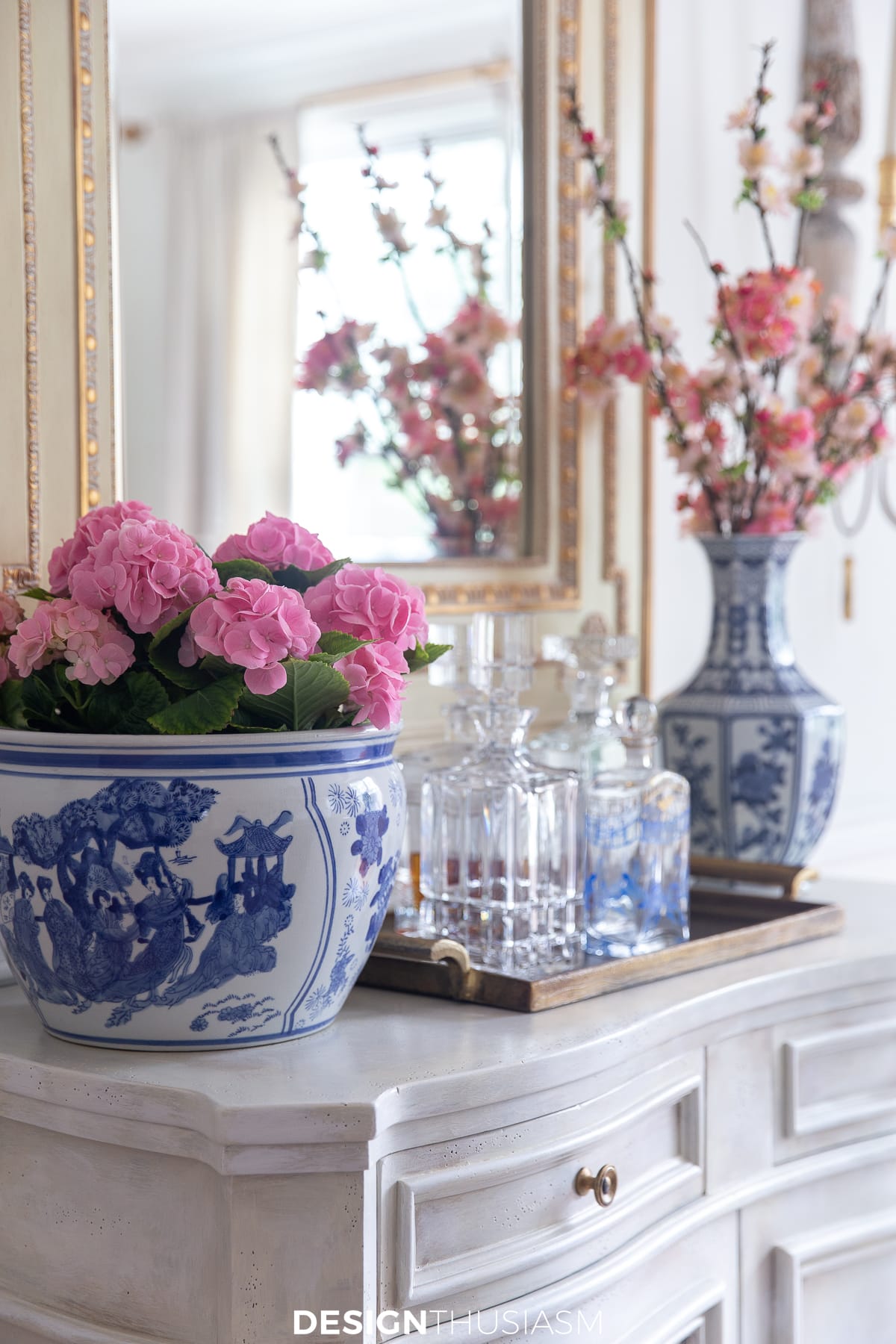 pink hydrangeas in a blue and white planter