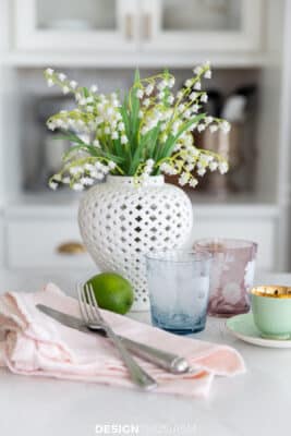 spring vignette with ginger jar and etched floral glasses