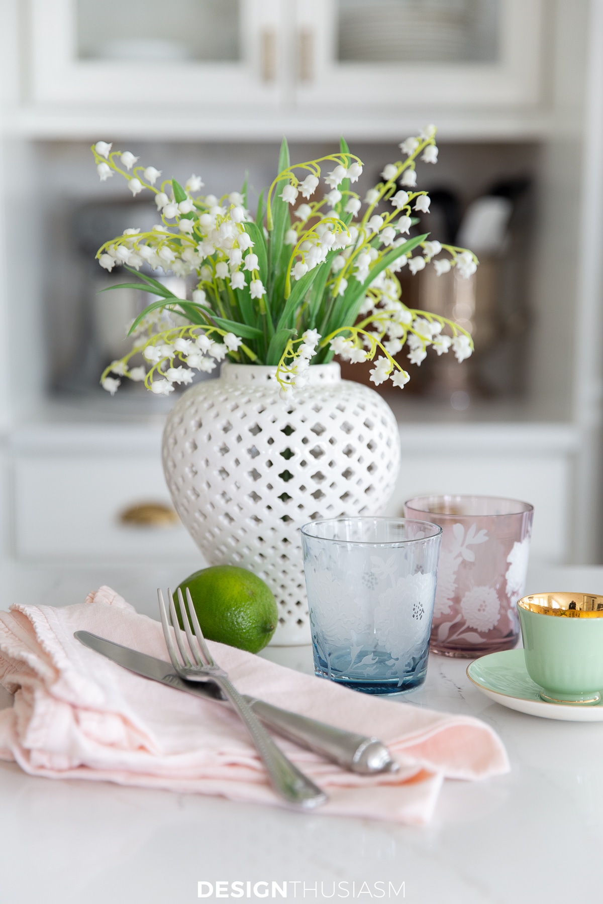 spring vignette with ginger jar and etched floral glasses