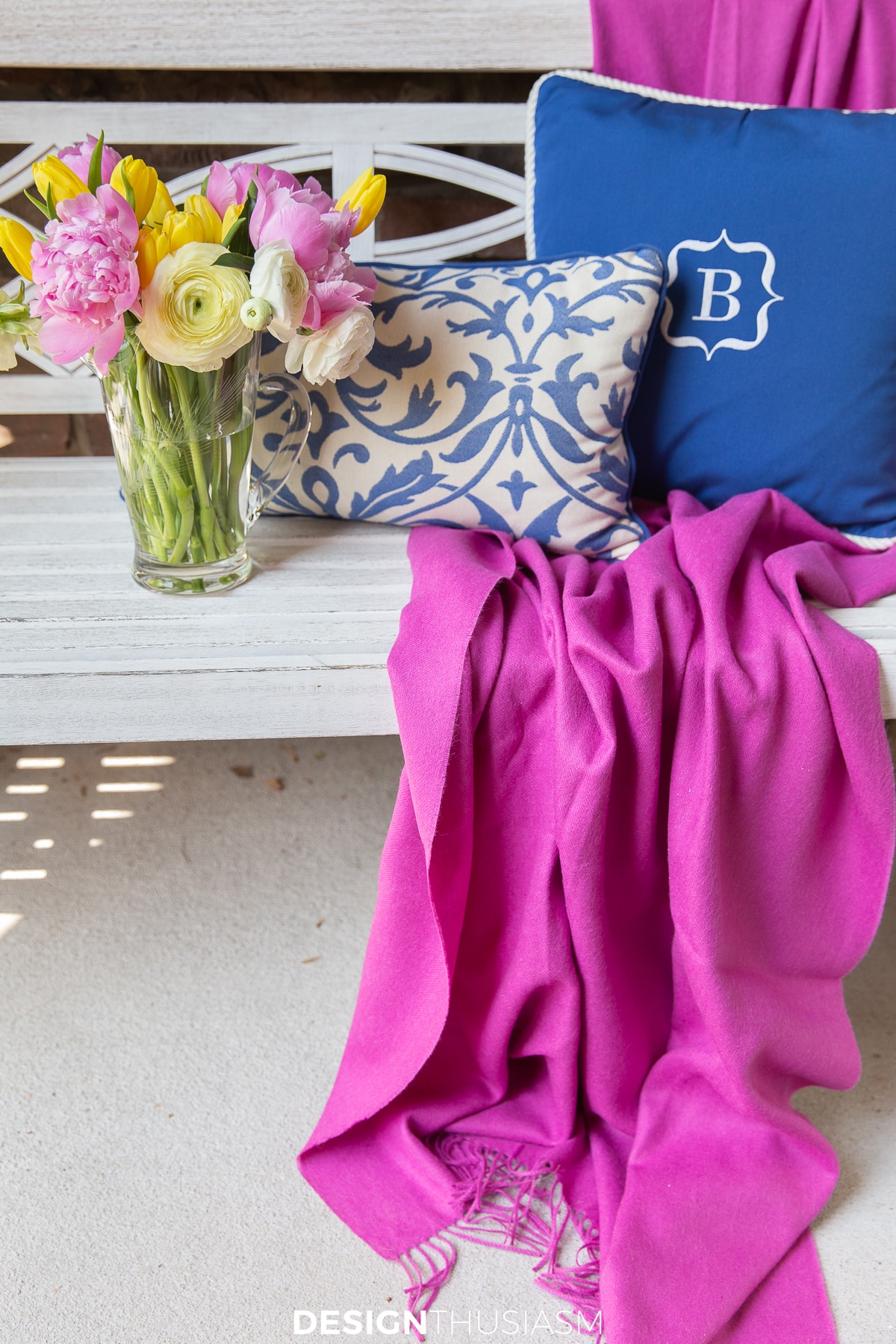 Outdoor Bench with Pillows and Throw in Summer Color