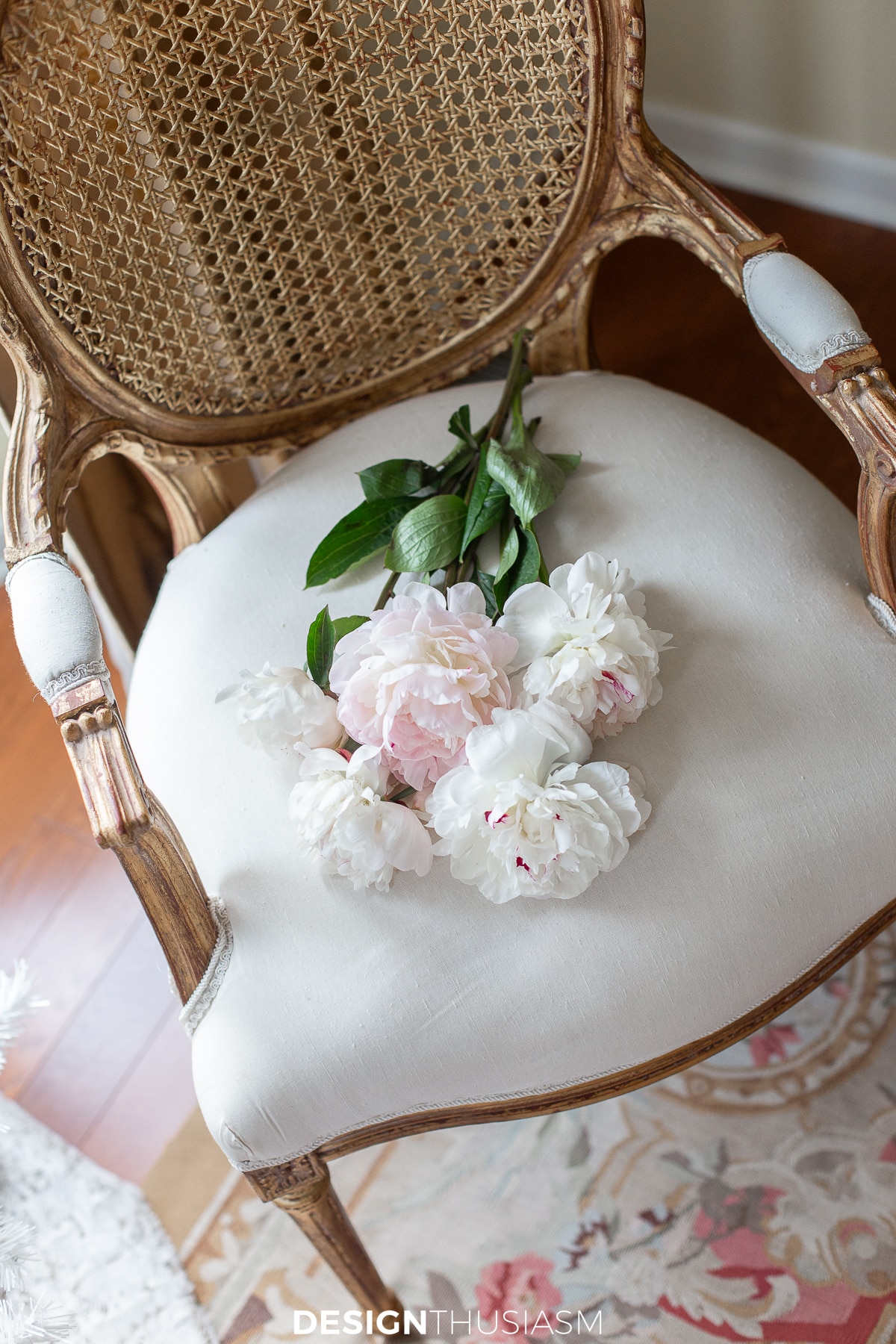Romantic Christmas decor peonies on french chair