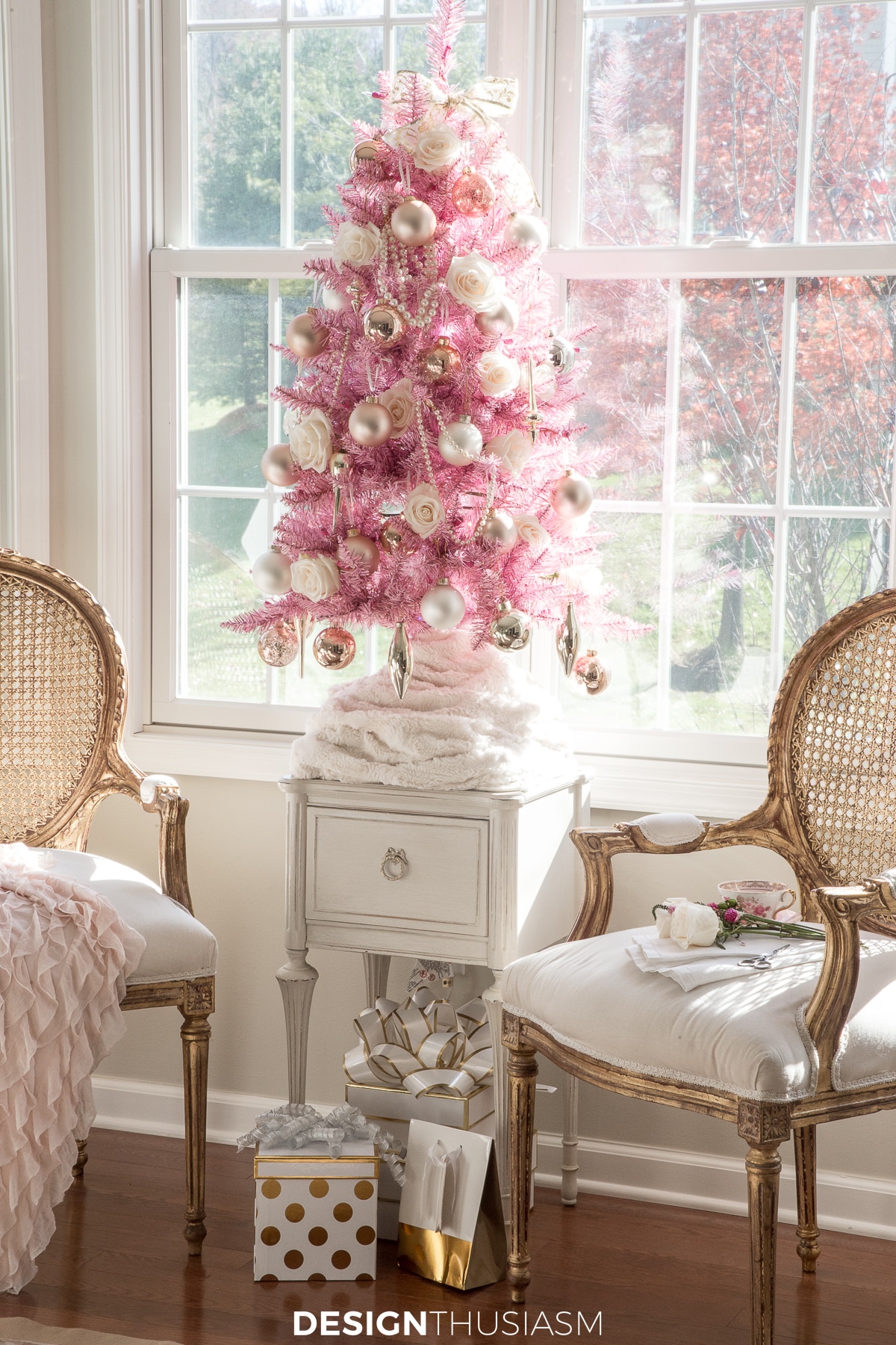 Romantic Christmas decor pink tree and french chairs