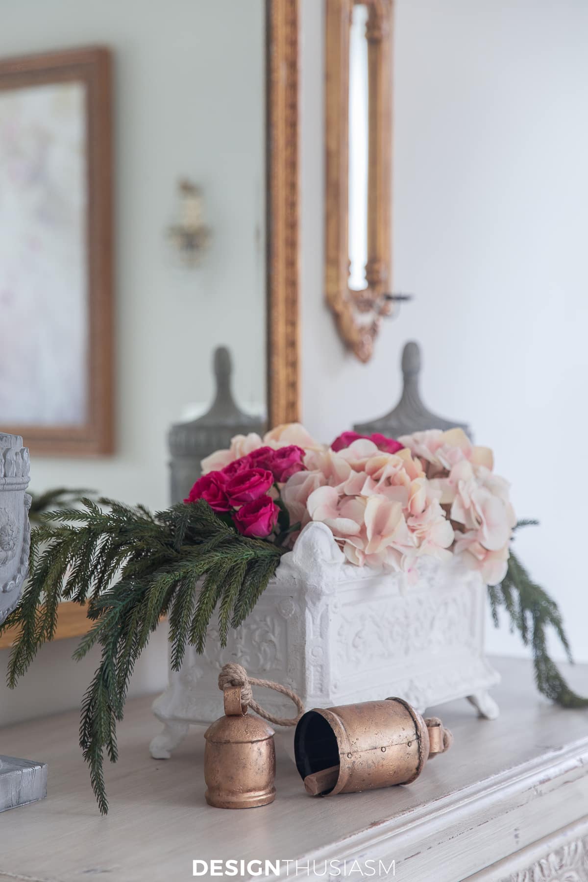 Romantic Christmas decor flowers, greenery and cow bells