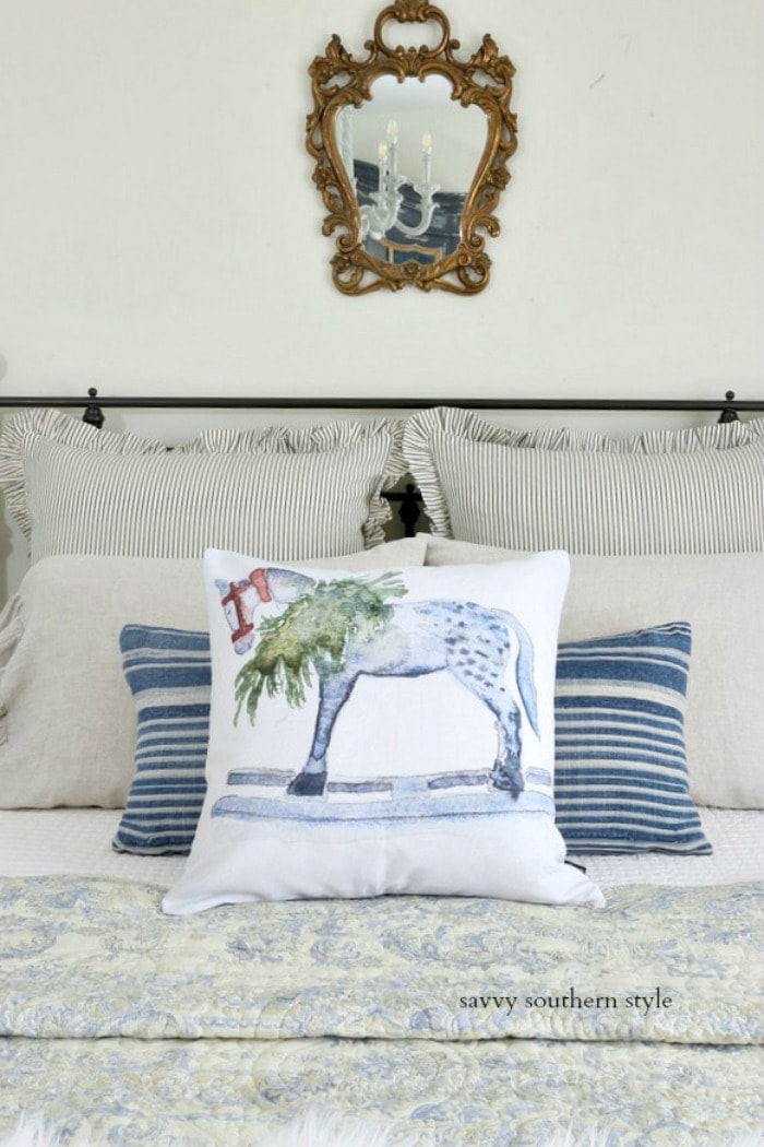 blue and white pillows and vintage French mirror savvysouthernstyle.net