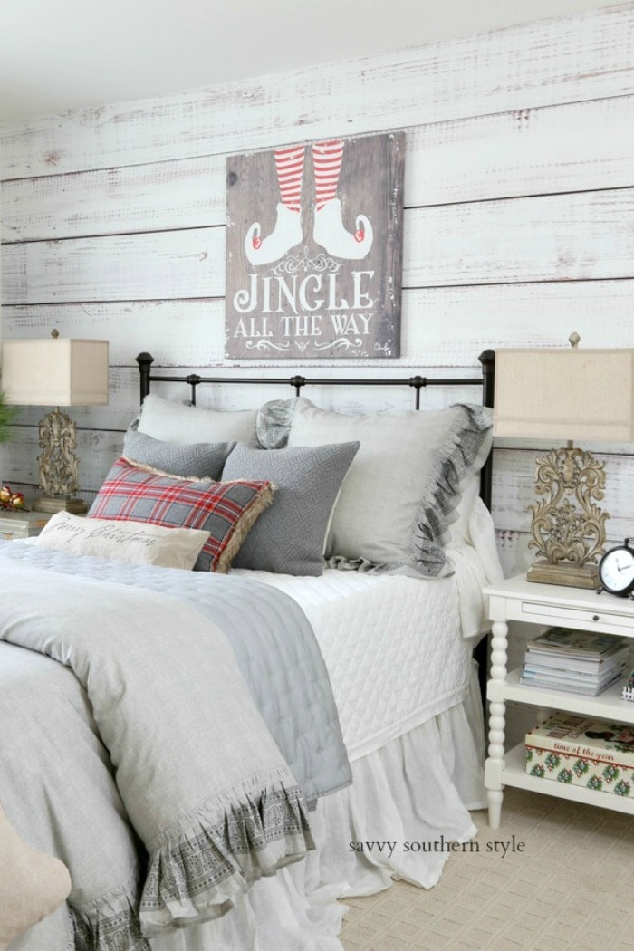 Christmas-decorated-bedroom-iron-bed-planked-wall