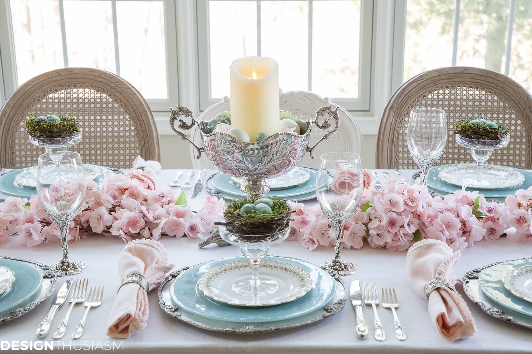 spring table setting with cherry blossom branch decorations
