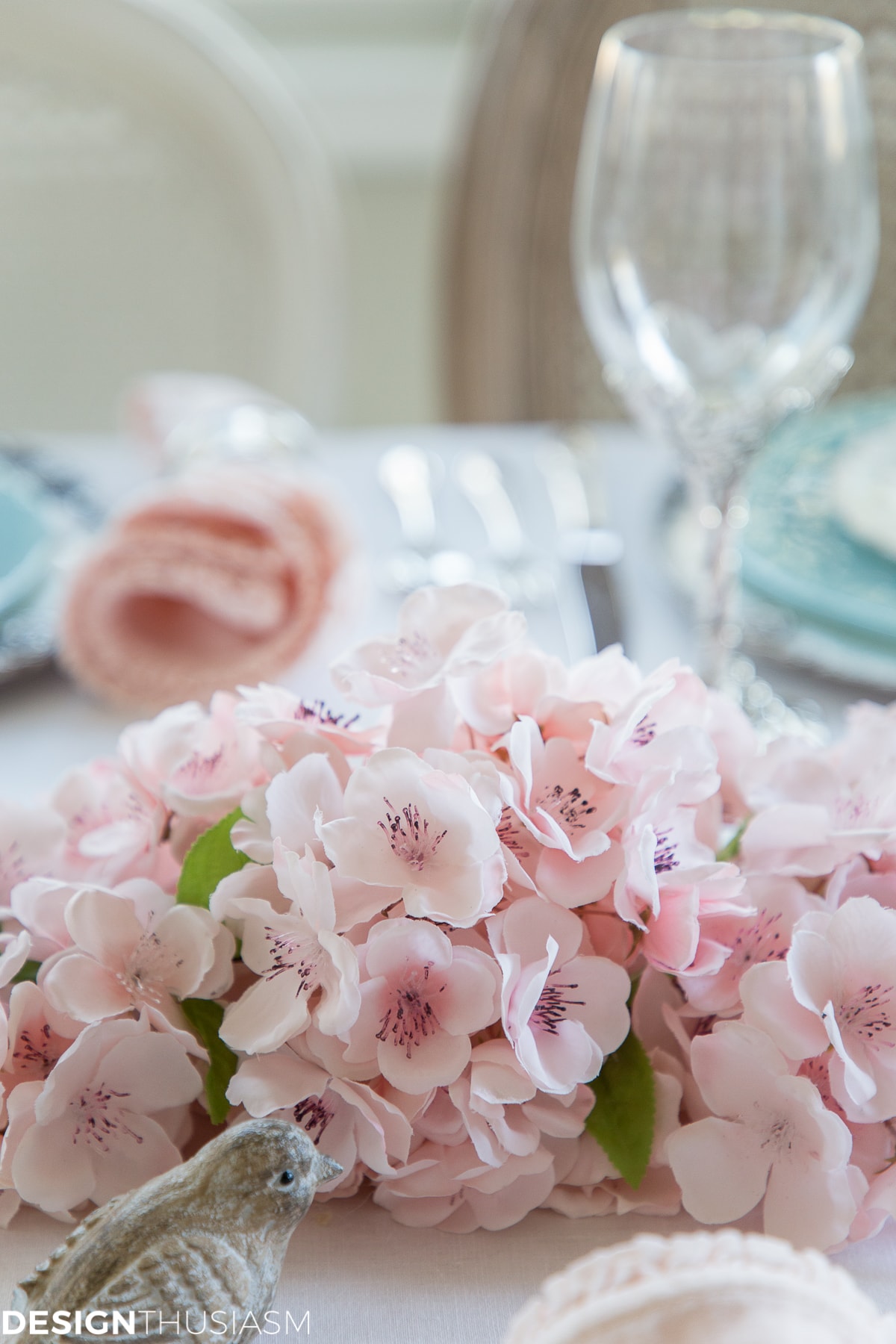 pink cherry blossom branch on a table