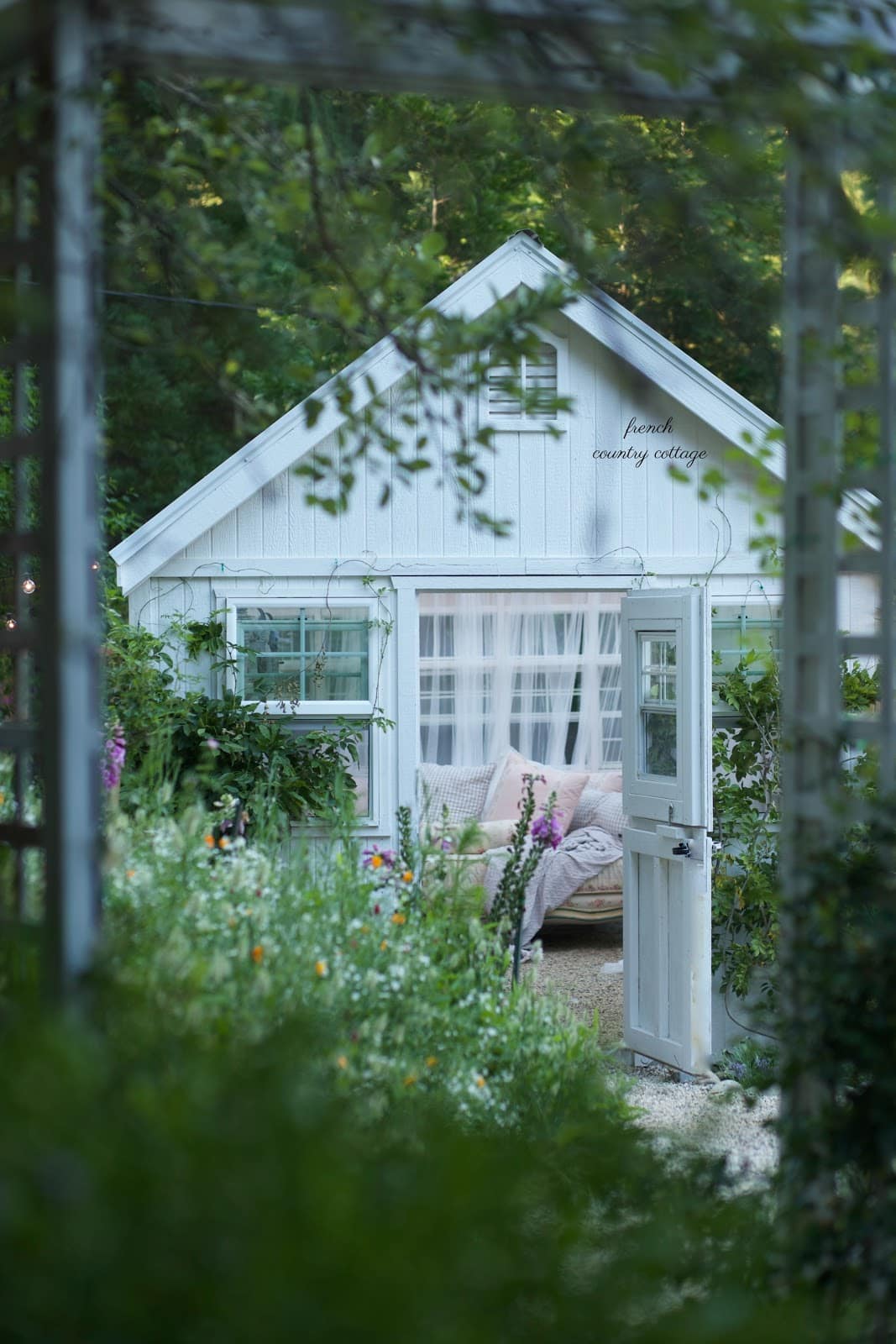 French Country Cottage She Shed through arbor