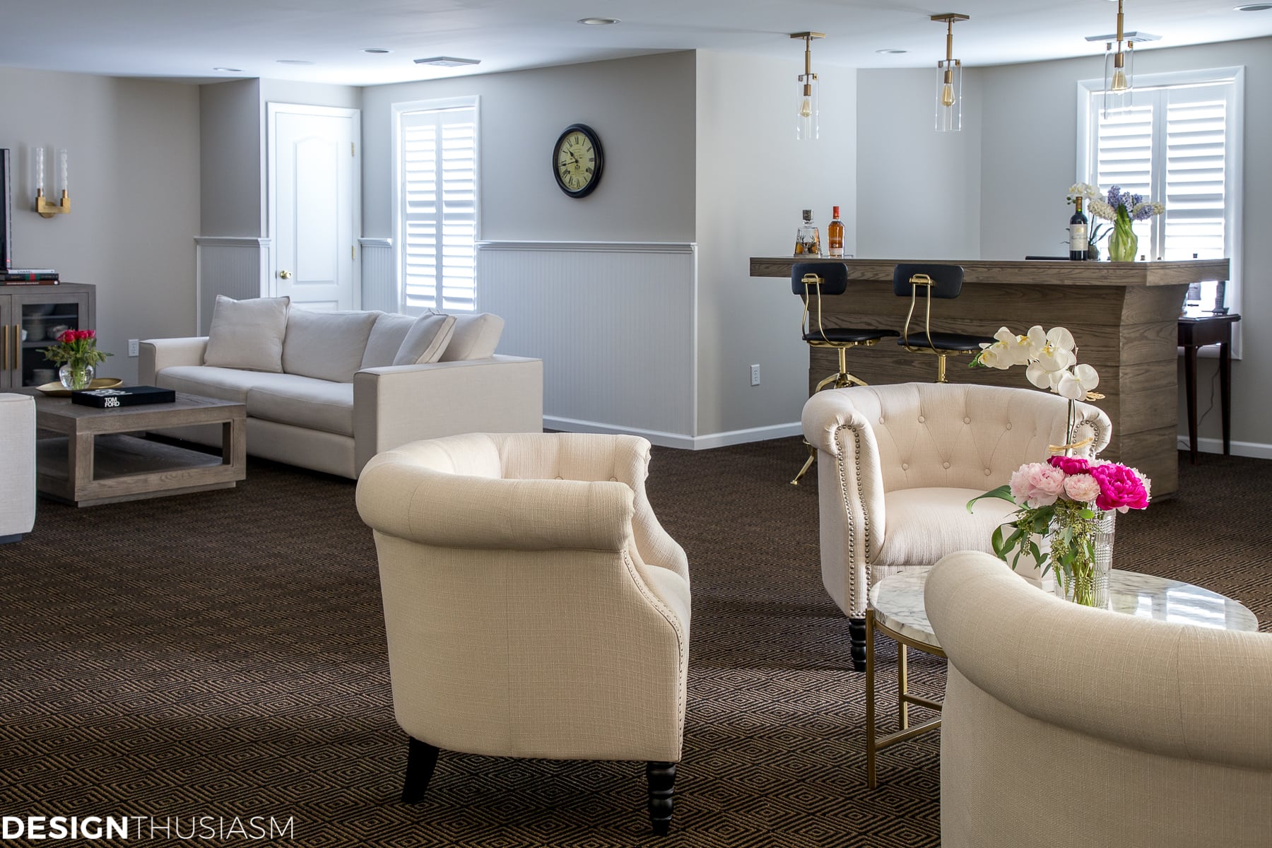 basement finishing bar area with plantation shutters on windows