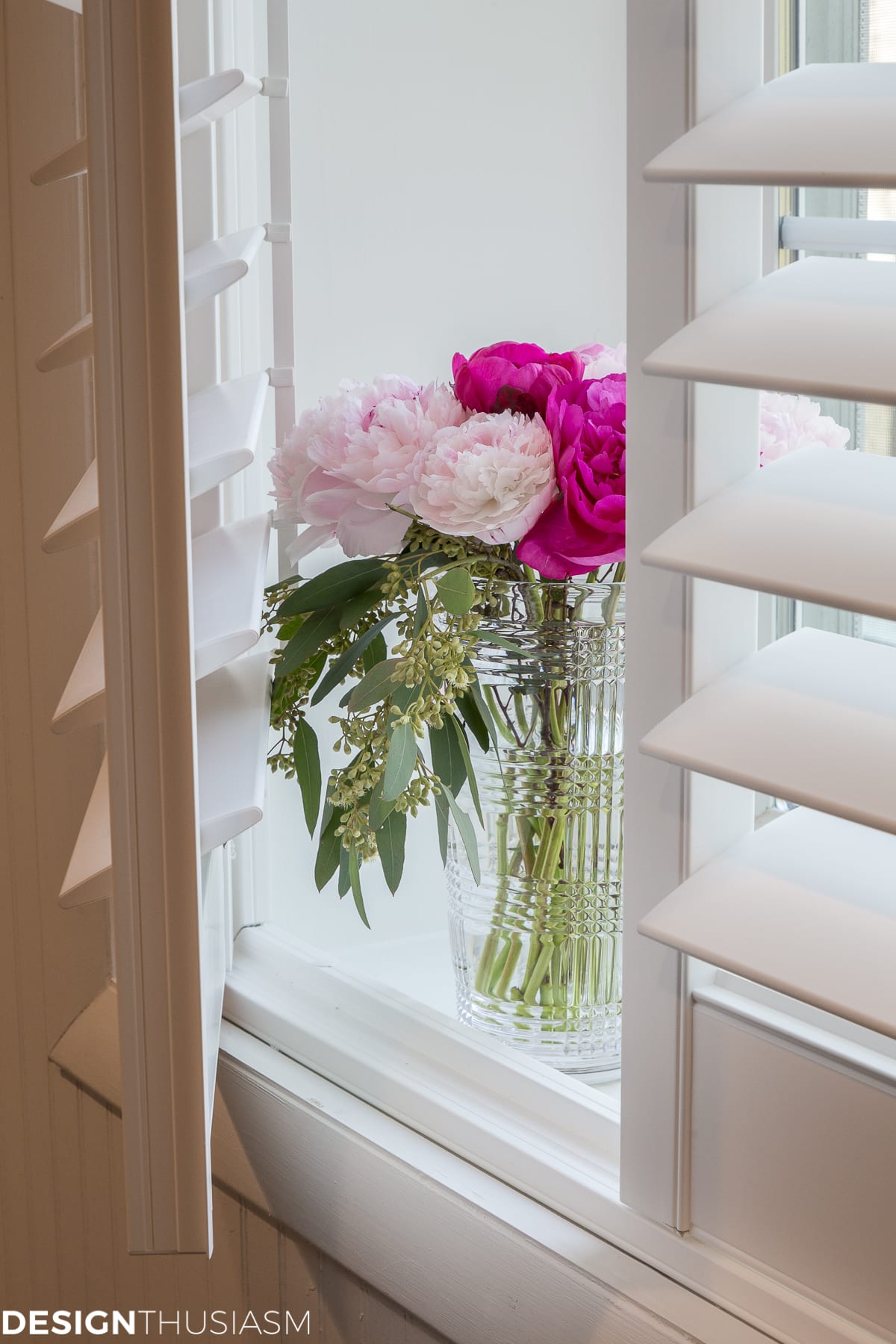 basement finishing plantation shutters on the windows