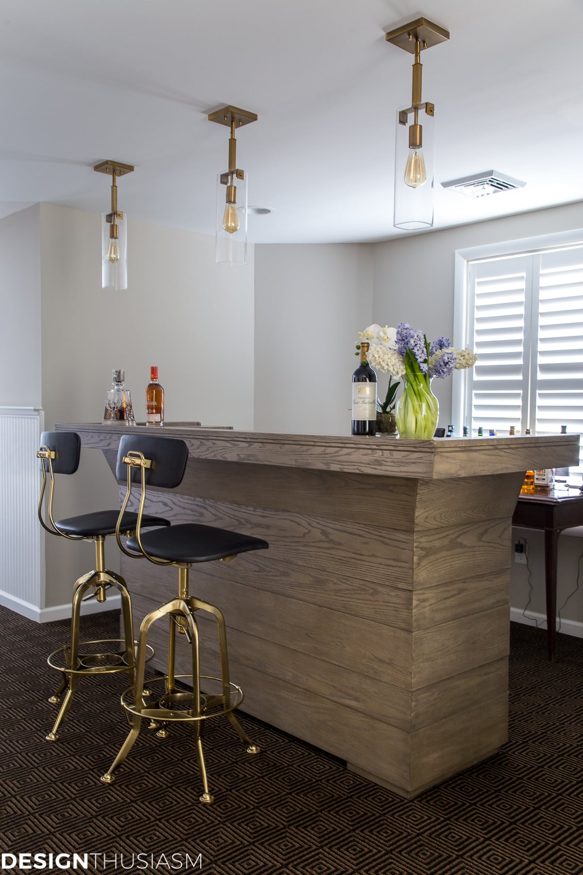 basement finishing bar with plantation shutters